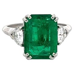 Platinum Engagement Ring with 0.6ct Triangular Diamonds 3.36 Ct Emerald GIA