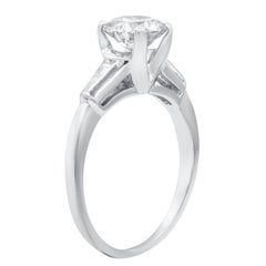 Platinum Engagement Ring with 1.03 Carat Round and 0.20 Ct Baguette Diamonds