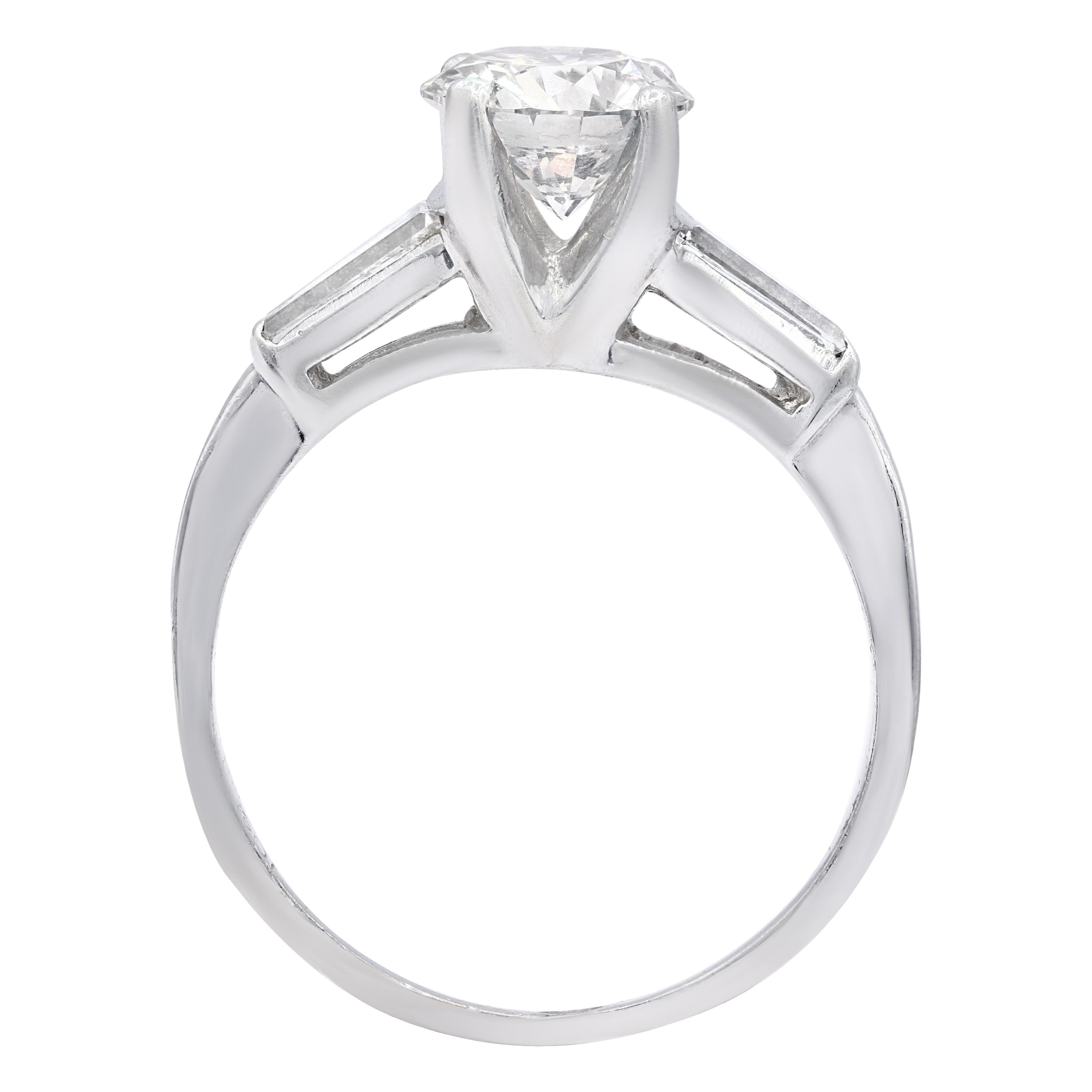 Round Cut Platinum Engagement Ring with 1.03 Carat Round and 0.20 Ct Baguette Diamonds For Sale
