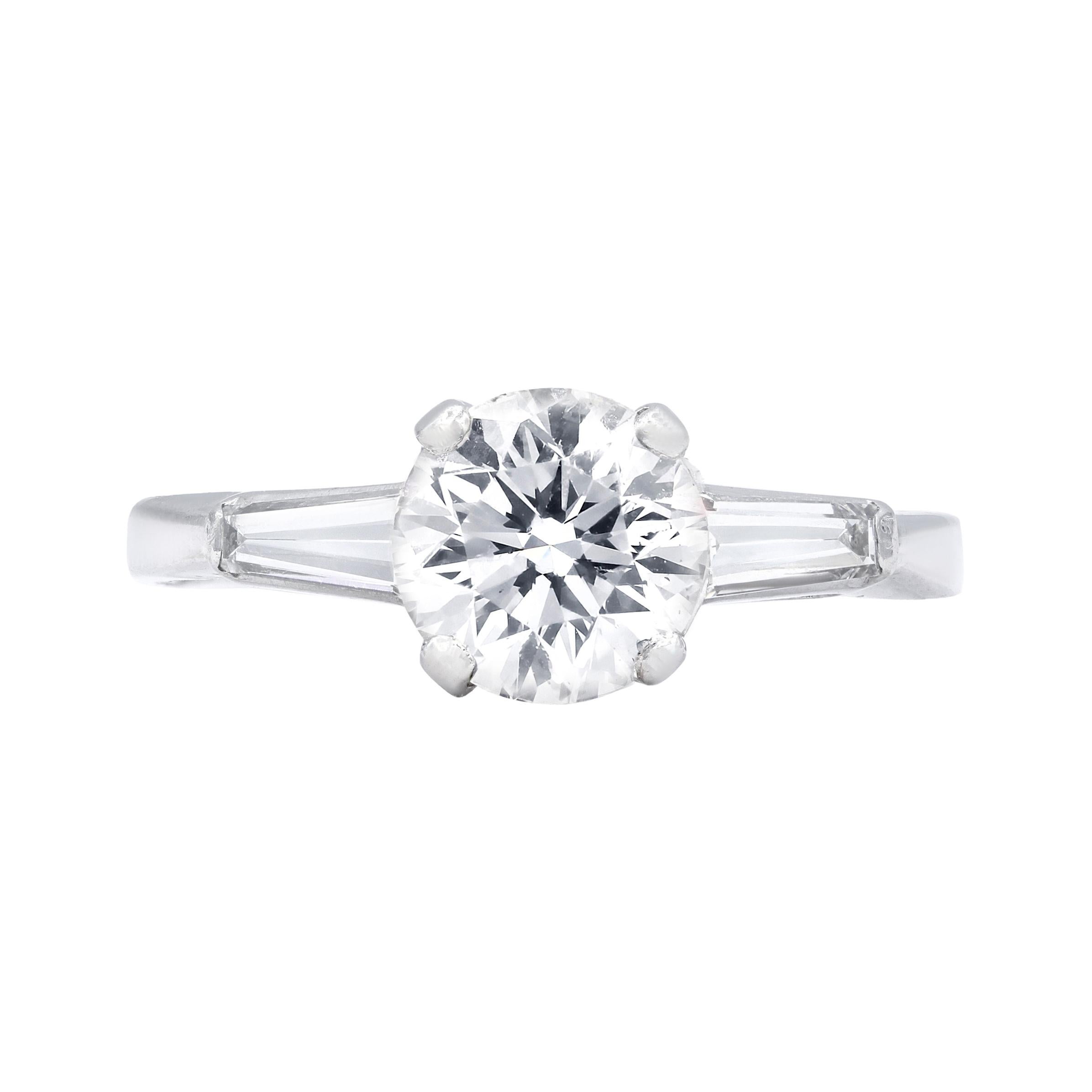 Platinum Engagement Ring with 1.03 Carat Round and 0.20 Ct Baguette Diamonds For Sale