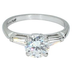 Platinum Engagement Ring with ~.75ct Round Center Stone & Tapered Baguettes