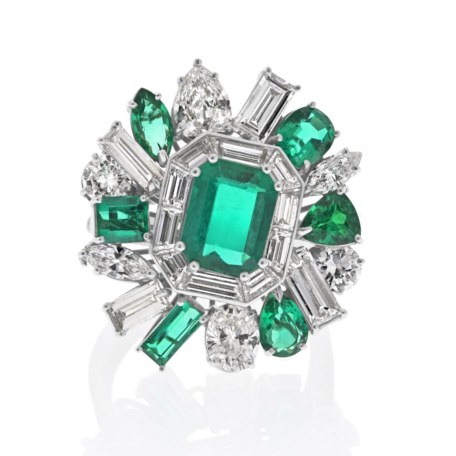 Unveiling the Elegance: Platinum Cocktail Ring with a Radiant Green Emerald.

Prepare to be captivated by a piece of artistry that transcends time and trends, a platinum cocktail ring designed to exude the epitome of luxury and grace.

**The Crown