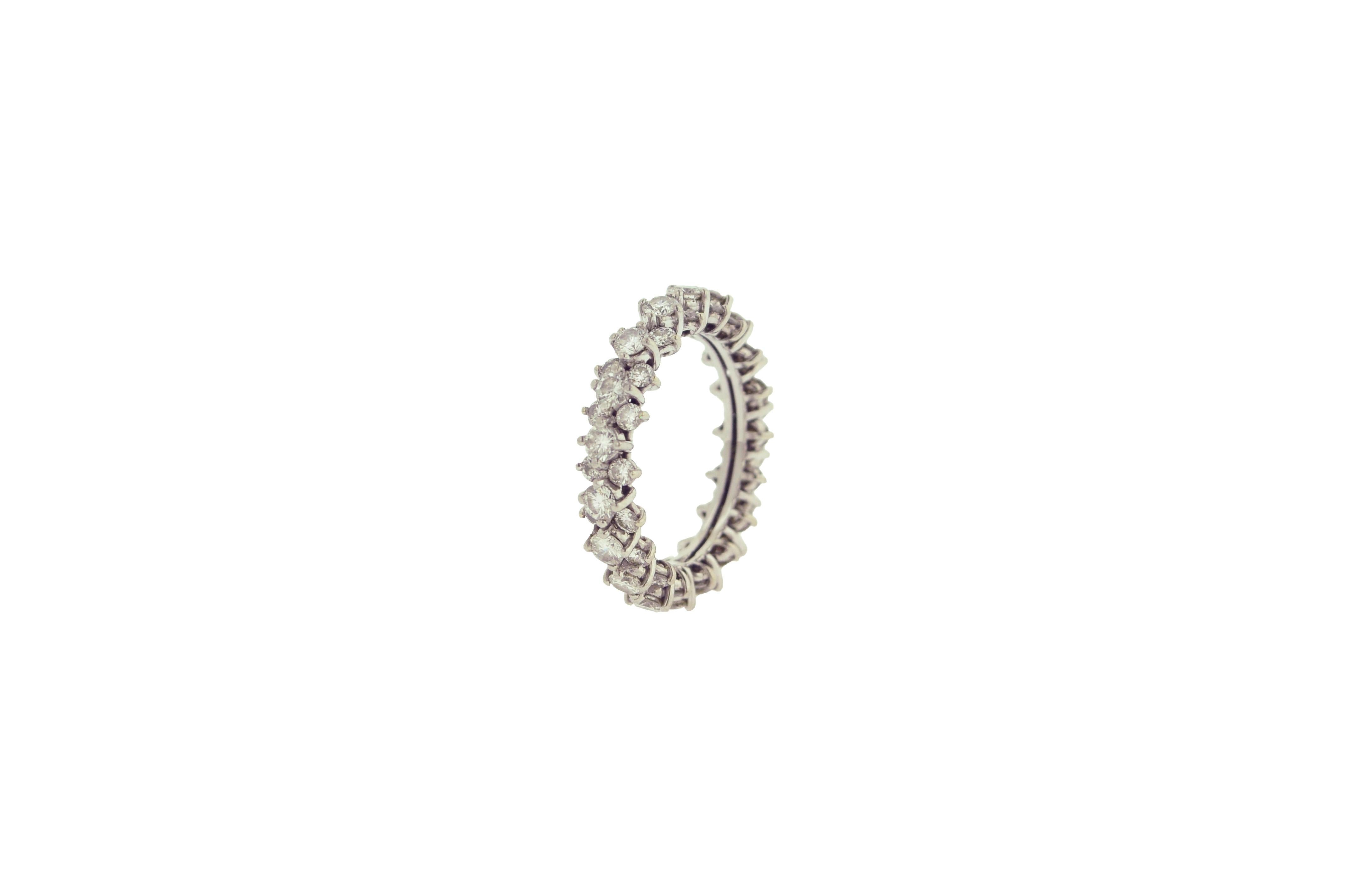 Beautiful estate eternity diamond ring set in Platinum. 

This eternity band is composed of 51 brilliant round cut white diamonds with a total weight of approximately 2.86 carats.

Ring size: 8 1/4