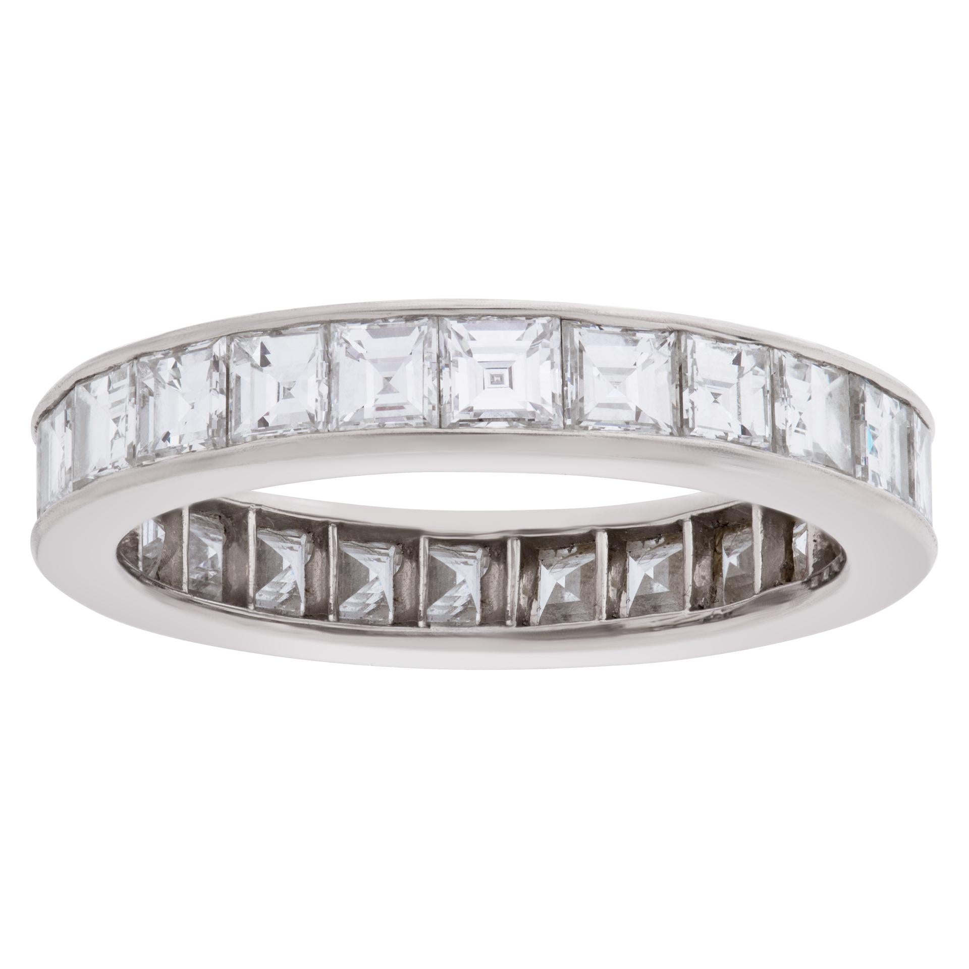 Platinum eternity band with approximately 3.12 carats in princess cut G-H color, VS-SI clarity diamonds. Size 6.5.

This Diamond ring is currently size 6.5 and some items can be sized up or down, please ask! It weighs 2.3 pennyweights and is