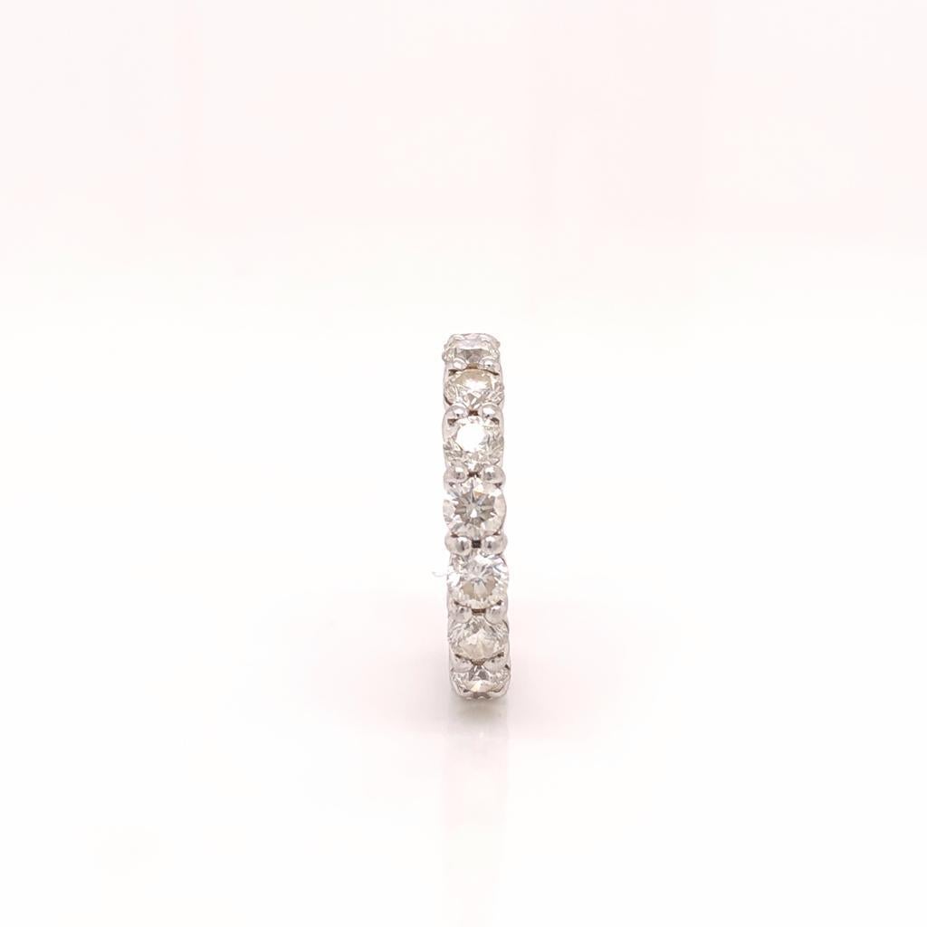 This exquisite diamond eternity ring features a seamless diamonds hand-set in a unique and low-profile Platinum Claw setting.
Photo may have been enlarged and/or enhanced.
Almost all gemstones have been treated to enhance their beauty and require