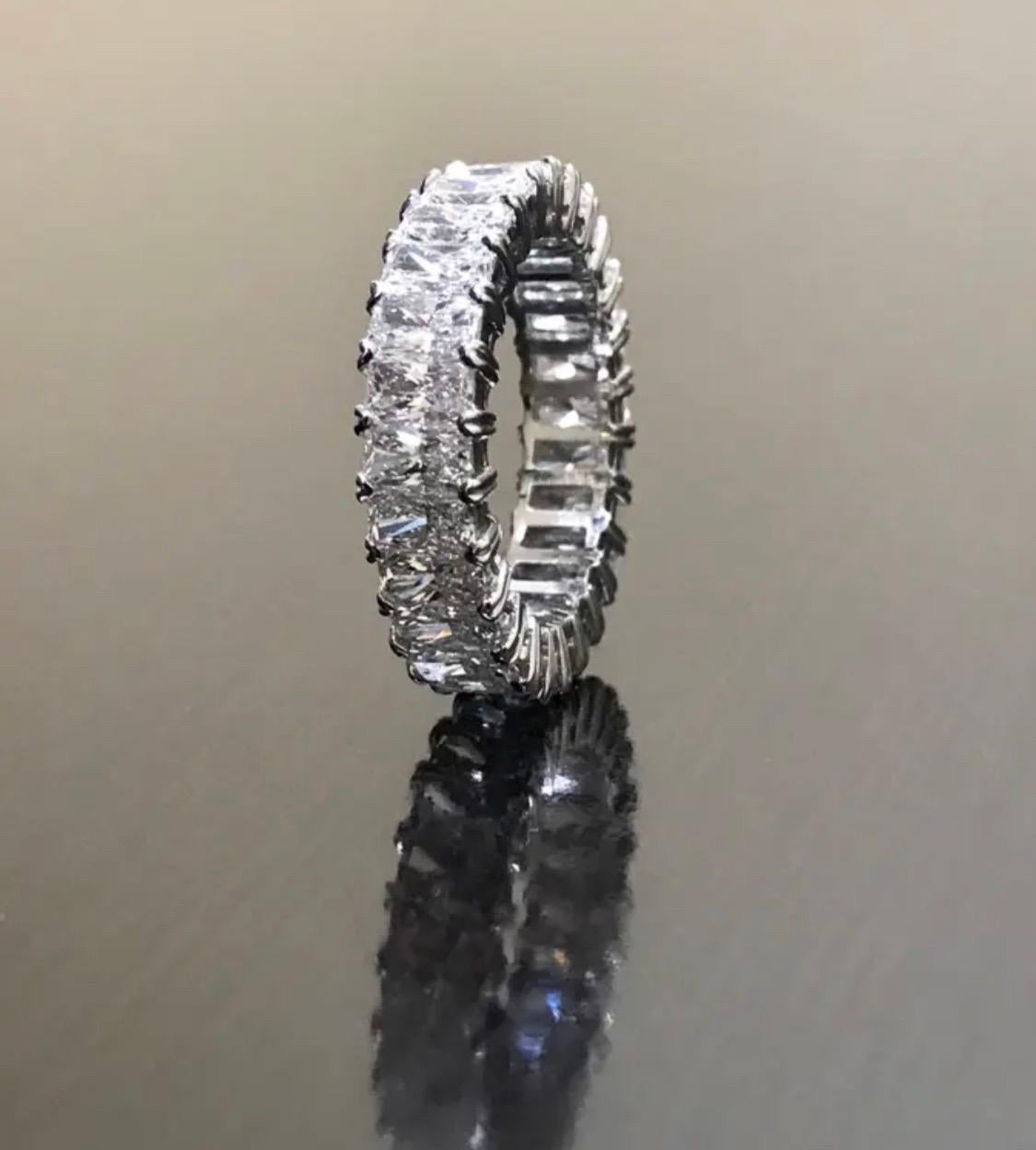 Dekara Design Collection

A Breathtaking, Timeless Classic Eternity Prong Set Radiant Cut Diamond Engagement Band.

This high end piece is handmade to perfection, from the stone setting to the beautiful polish.

Metal- 90% Platinum, 10%