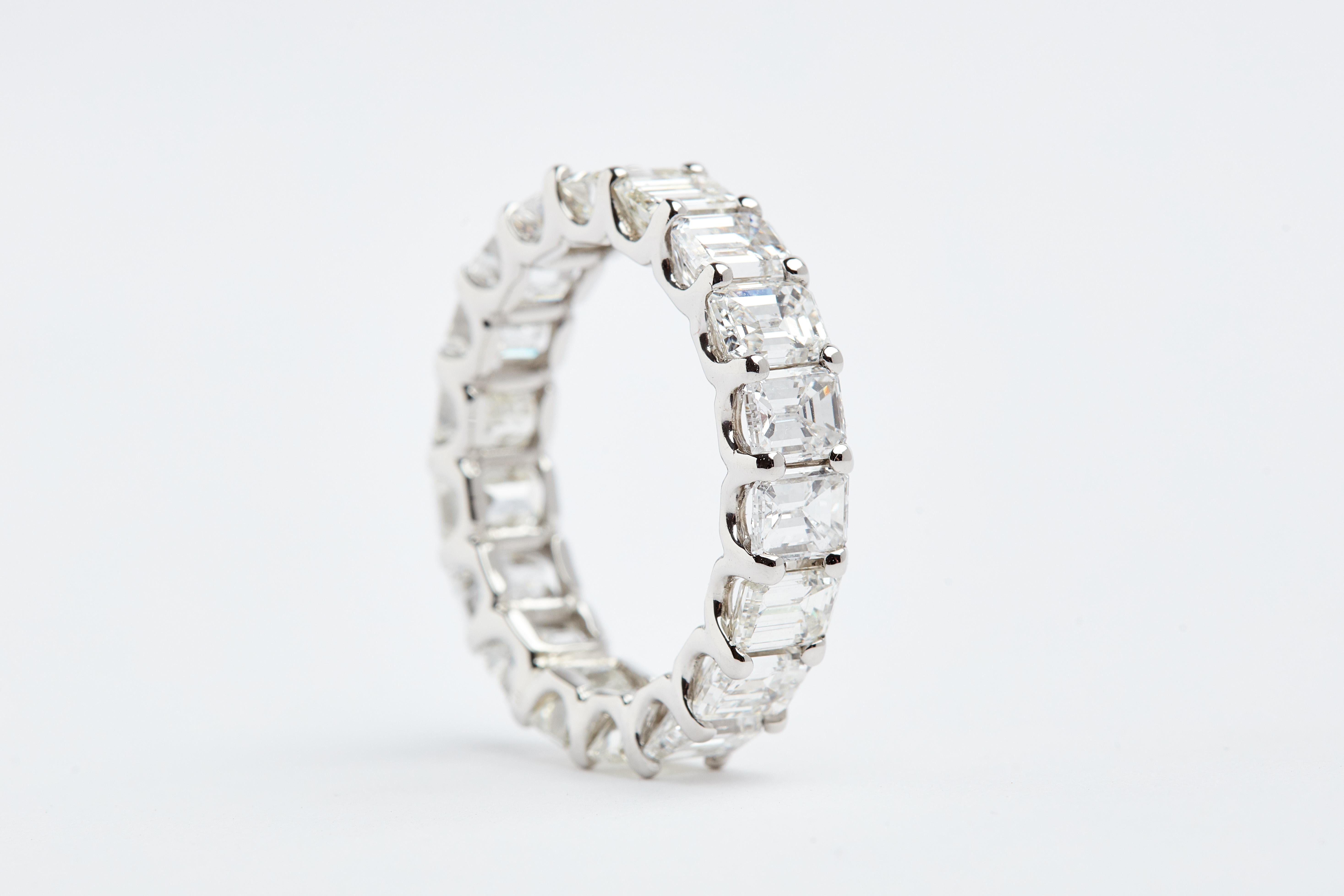 Platinum Eternity Emerald Cut diamond band. 18 emerald cut white diamonds weighing aprox 7.50 carats