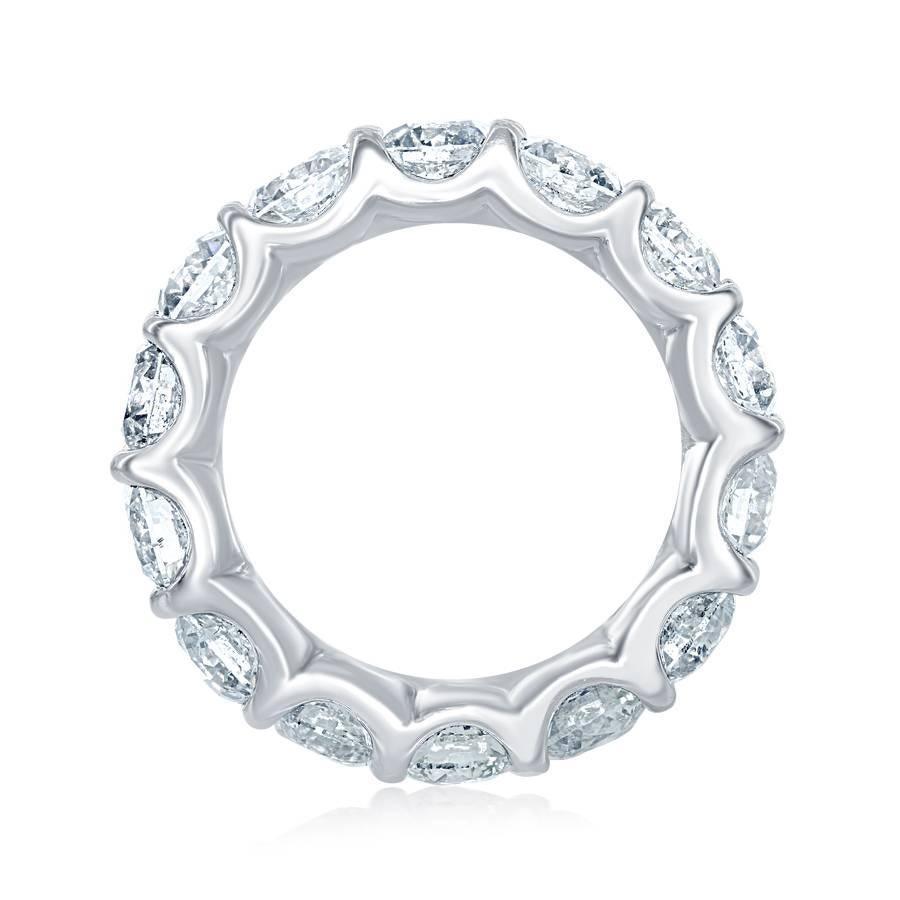 This Low setting eternity band is absolutely a magnificent piece. Total weight is 5.61 carats. The ring consists of 14 stones each weighing approximately 0.40 carats. The color is G-H and the clarity is SI-SI2. This eternity is set in platinum. Ring