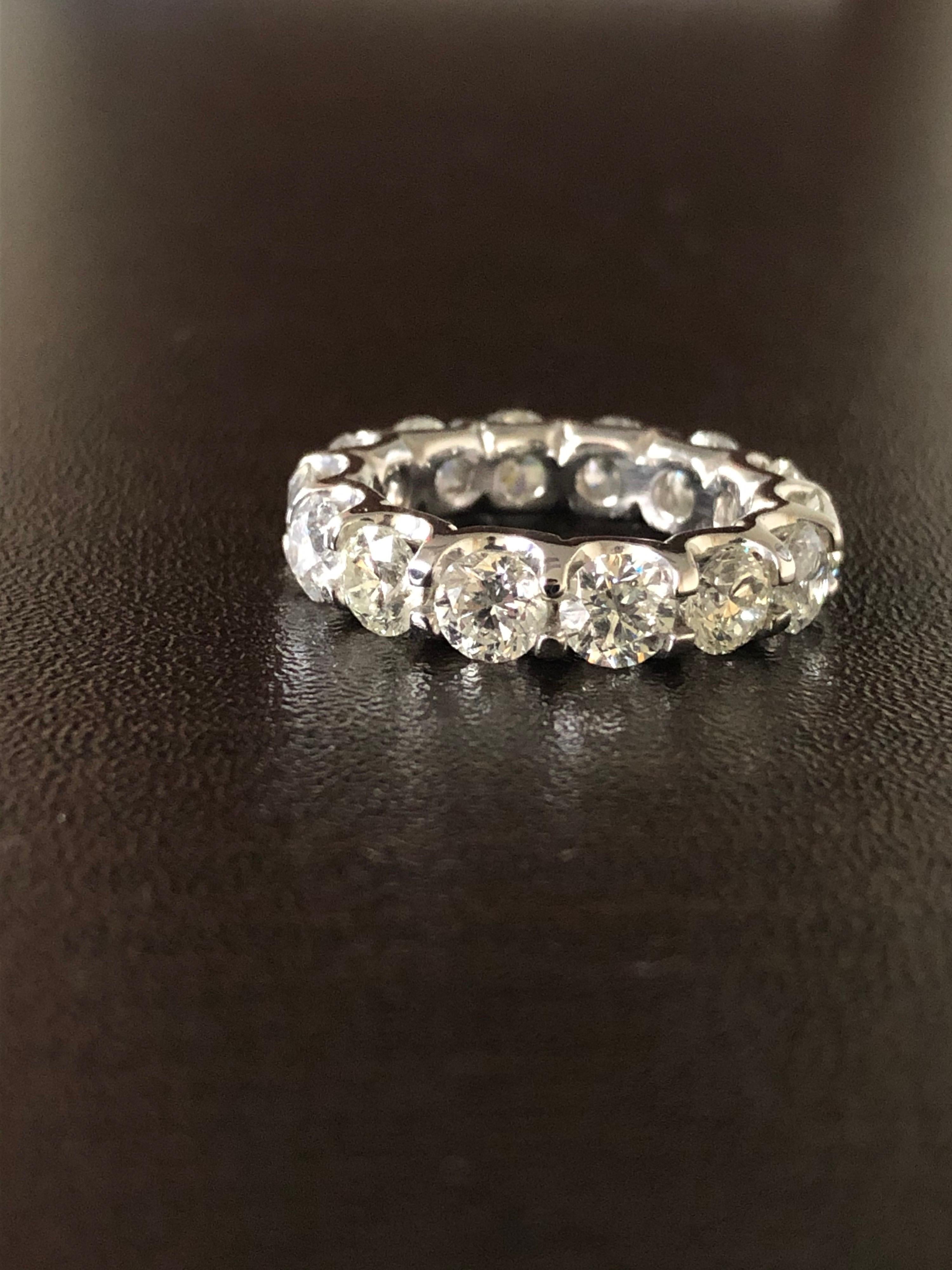 Modern Platinum Eternity Ring 5.50 Carat For Sale