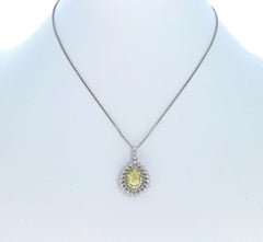 Platinum Fancy Intense Yellow Diamond & White Diamond Pendant Necklace 0.66ctw