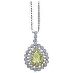 Platinum Fancy Intense Yellow Diamond & White Diamond Pendant Necklace 0.66ctw