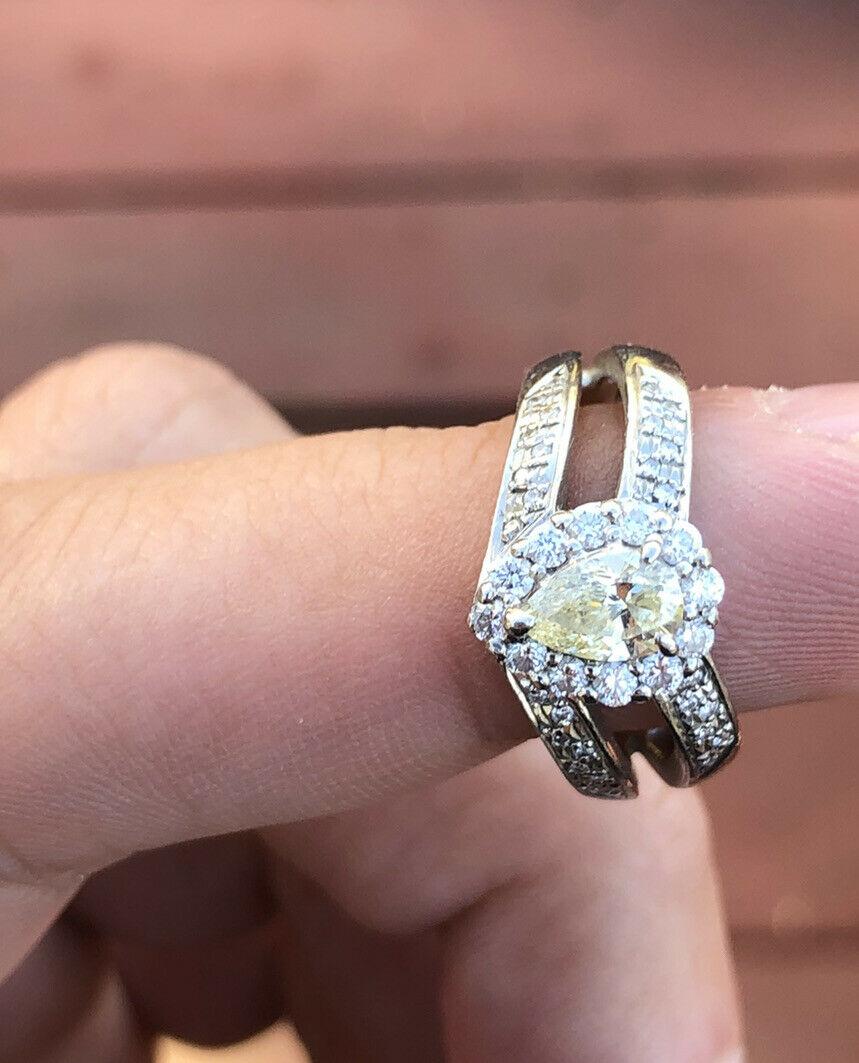 Pear Cut Platinum Fancy Yellow Diamond and White Diamond Pear Shape Ring 0.90 Carat 6.9g