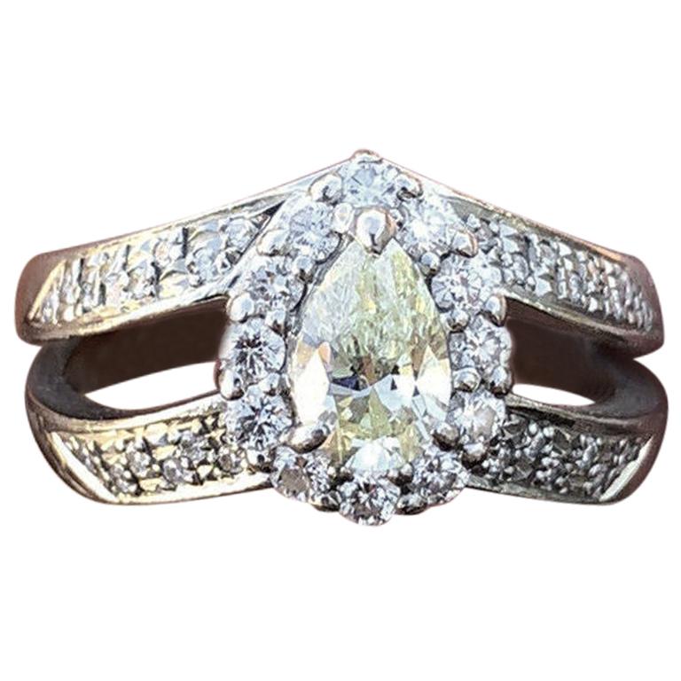 Platinum Fancy Yellow Diamond and White Diamond Pear Shape Ring 0.90 Carat 6.9g