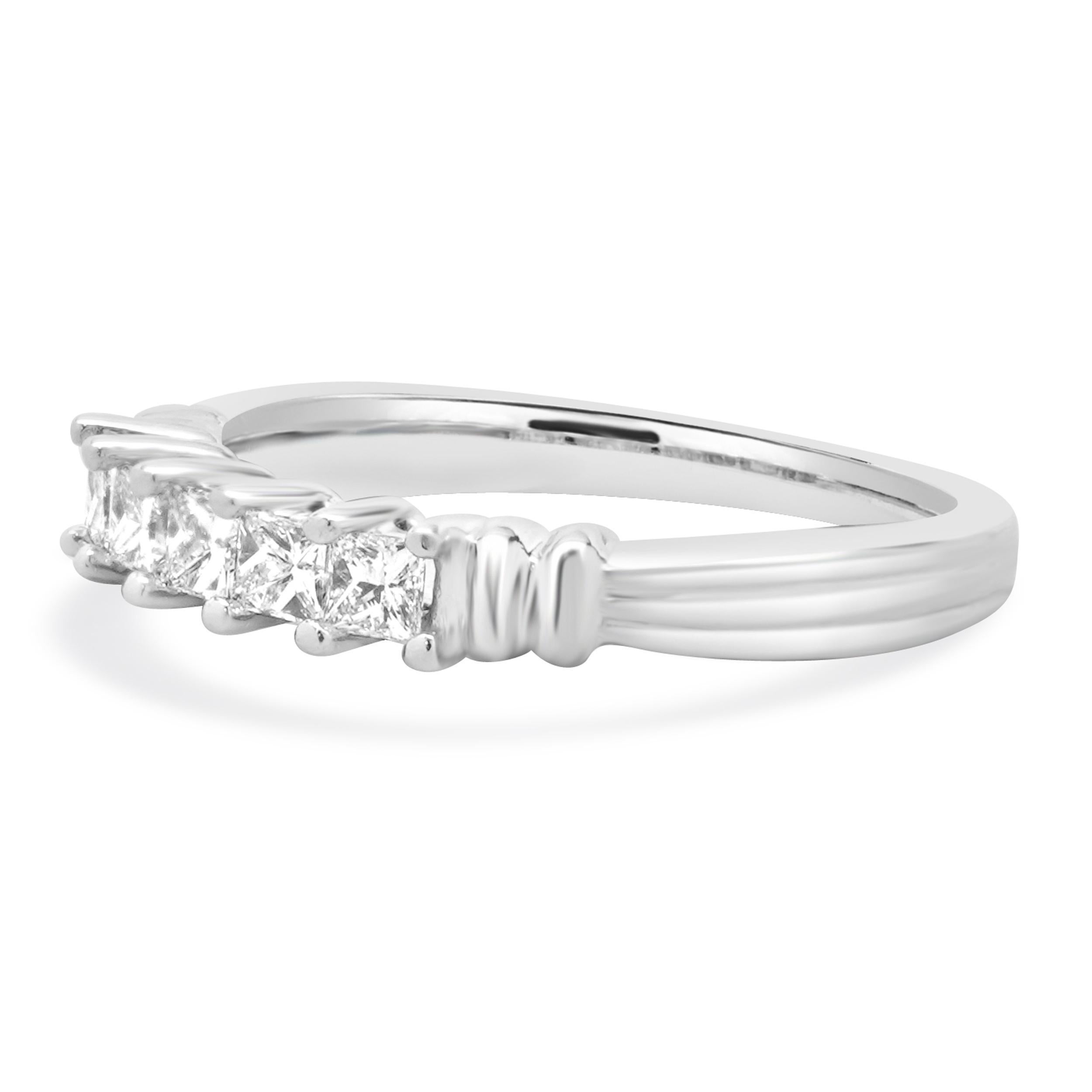 Designer: custom
Material: platinum
Diamond: 5 princess cut = 0.48cttw
Color: H 
Clarity: VS2
Ring size: 7 (please allow two additional shipping days for sizing requests)
Weight: 6.18 grams