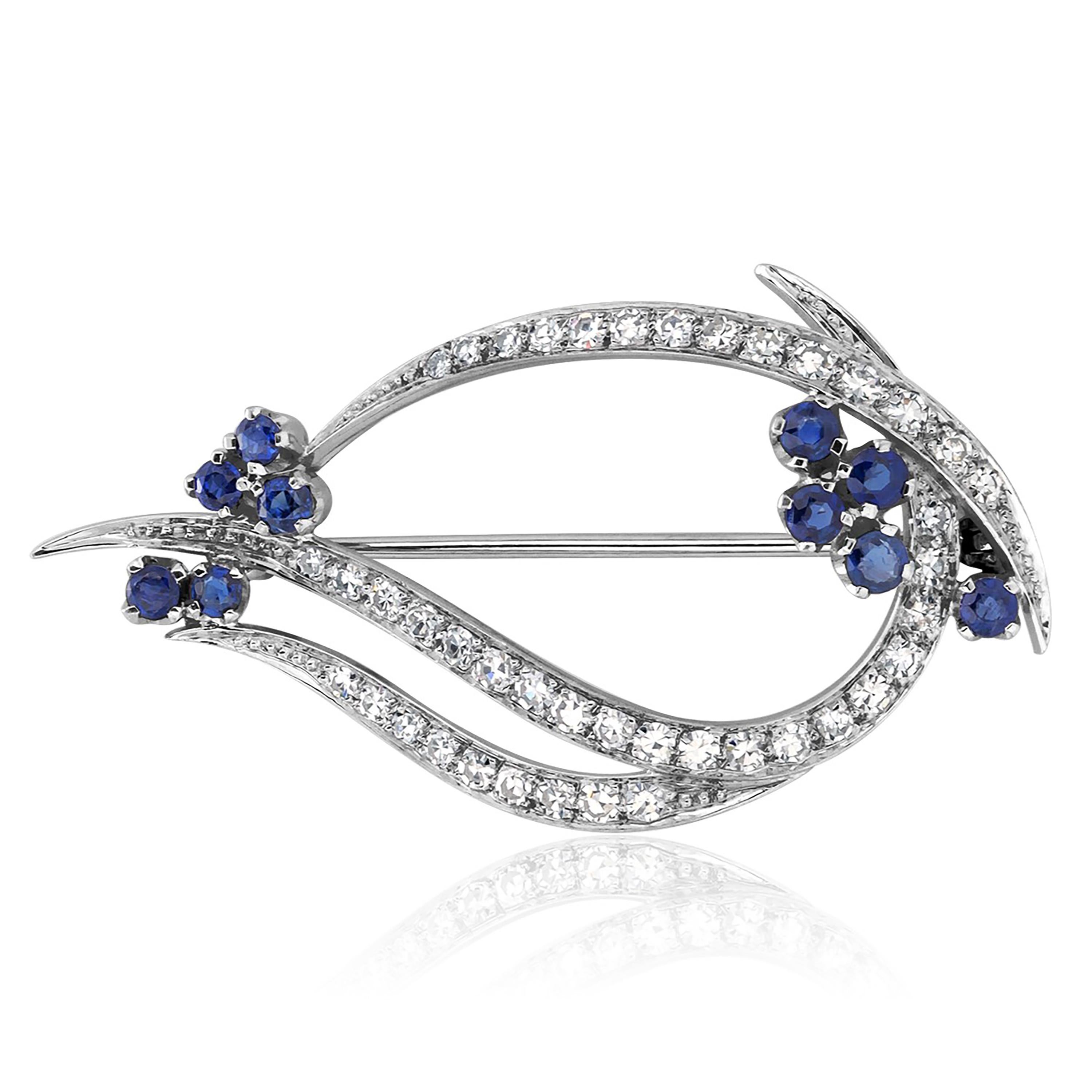 Platinum 1.75 Inch Flower Cluster Spray Brooch Diamond Leaves and Sapphires  In Good Condition For Sale In New York, NY