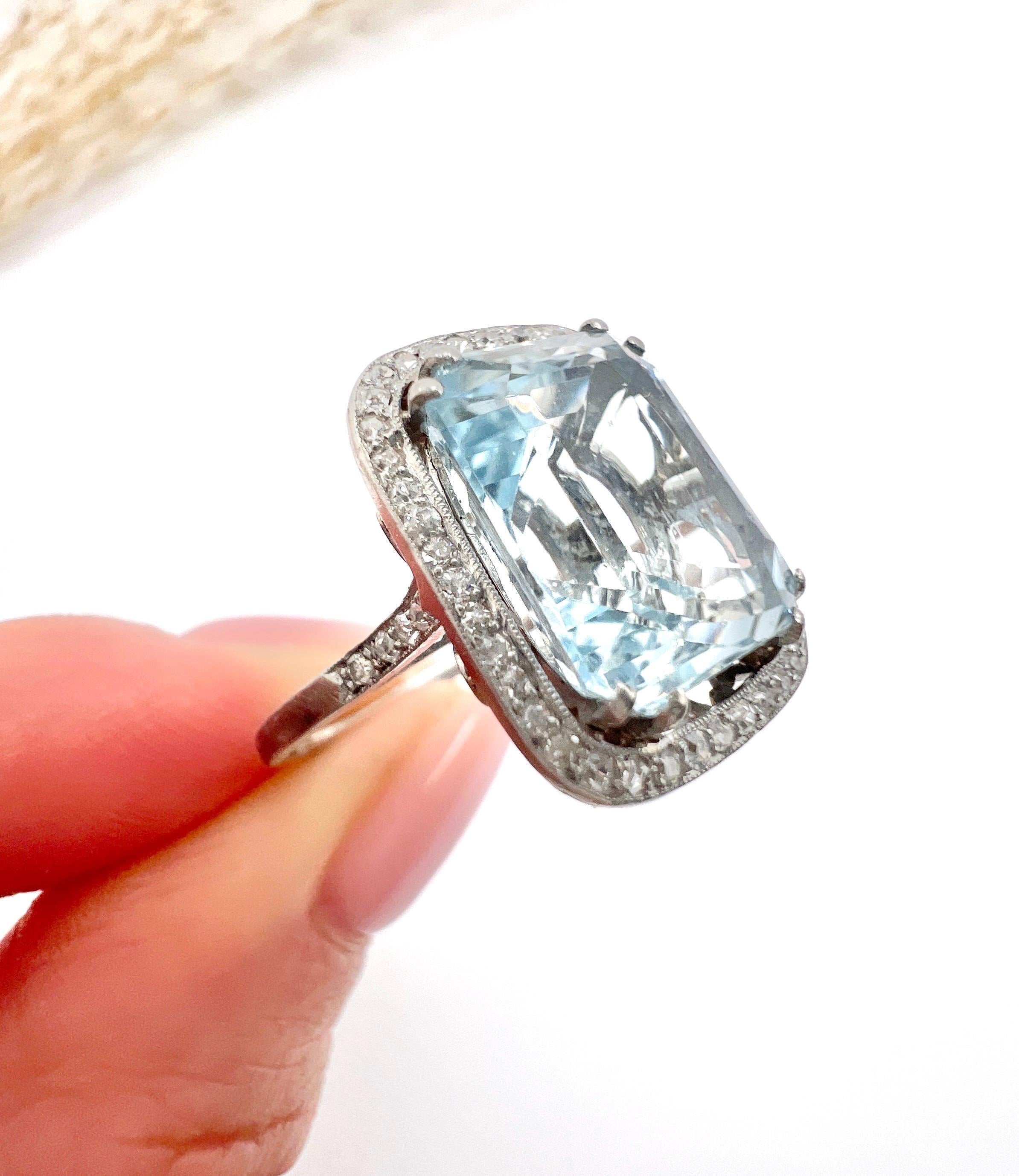 Vintage Aquamarine Ring 

Platinum French

Circa 1940s

Step back in time with this stunning rectangular-shaped halo ring, crafted in France during the glamorous 1940s. The centrepiece of the ring features an exquisite estimated 10-carat aquamarine,