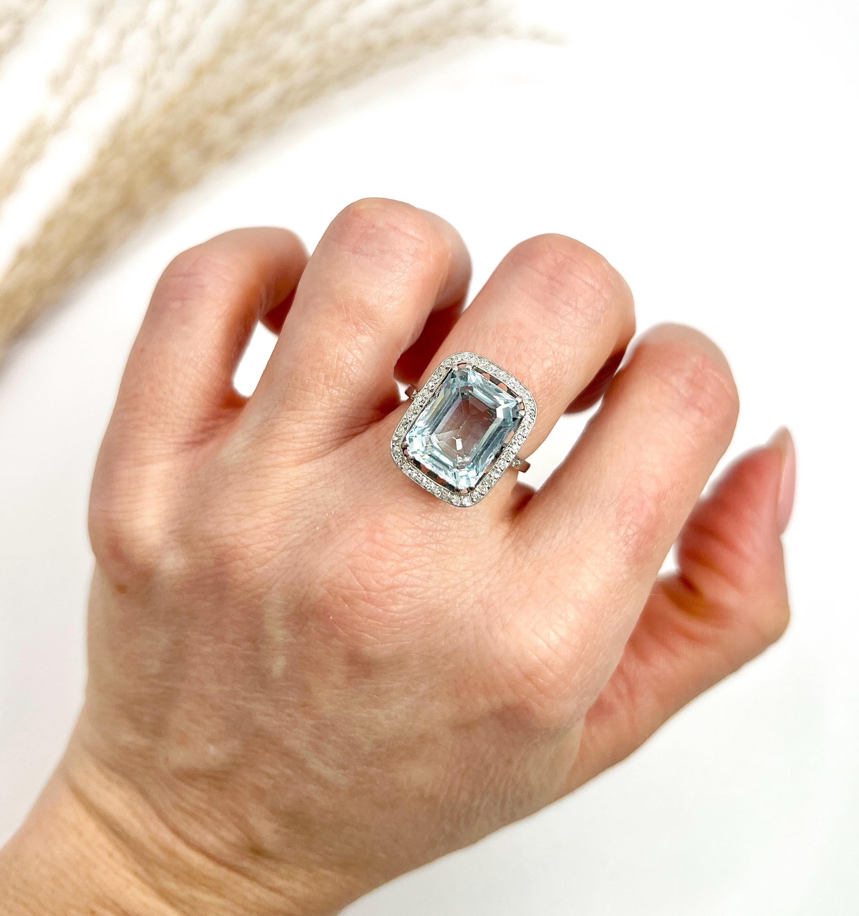 Platinum French, 1940s Emerald Cut Aquamarine & Diamond Halo Ring In Good Condition For Sale In Brighton, GB