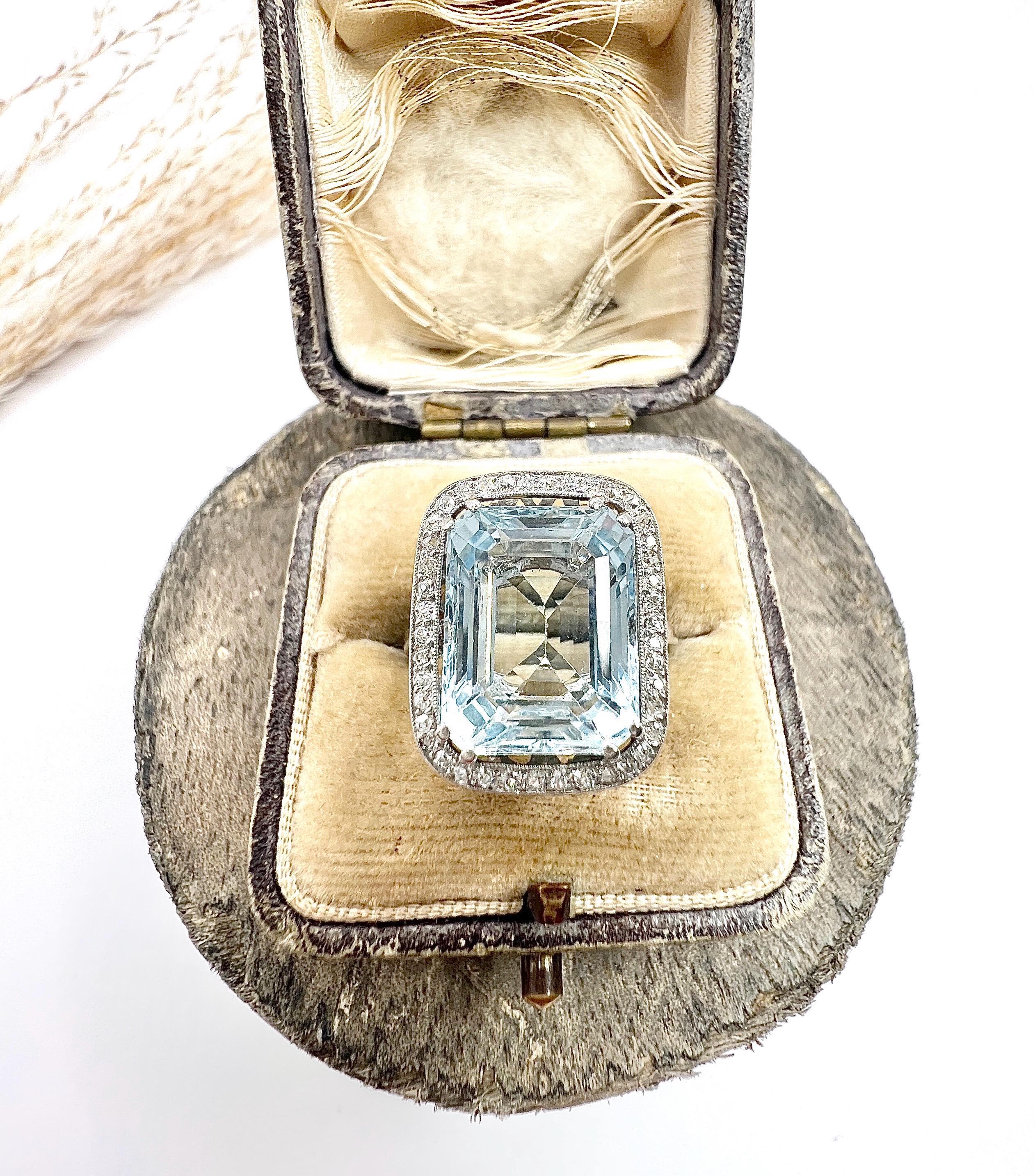 Women's or Men's Platinum French, 1940s Emerald Cut Aquamarine & Diamond Halo Ring For Sale