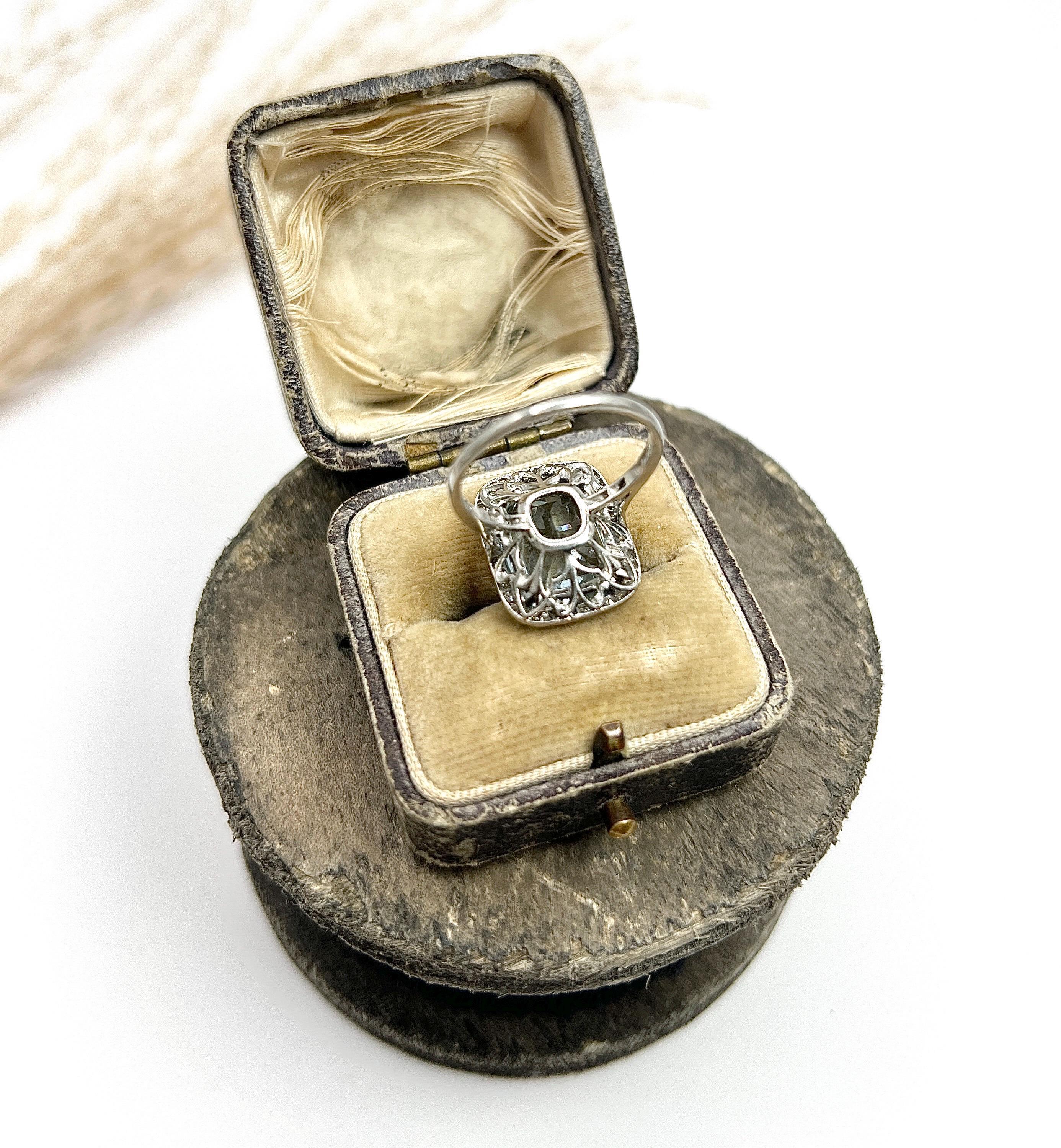 Platinum French, 1940s Emerald Cut Aquamarine & Diamond Halo Ring For Sale 4