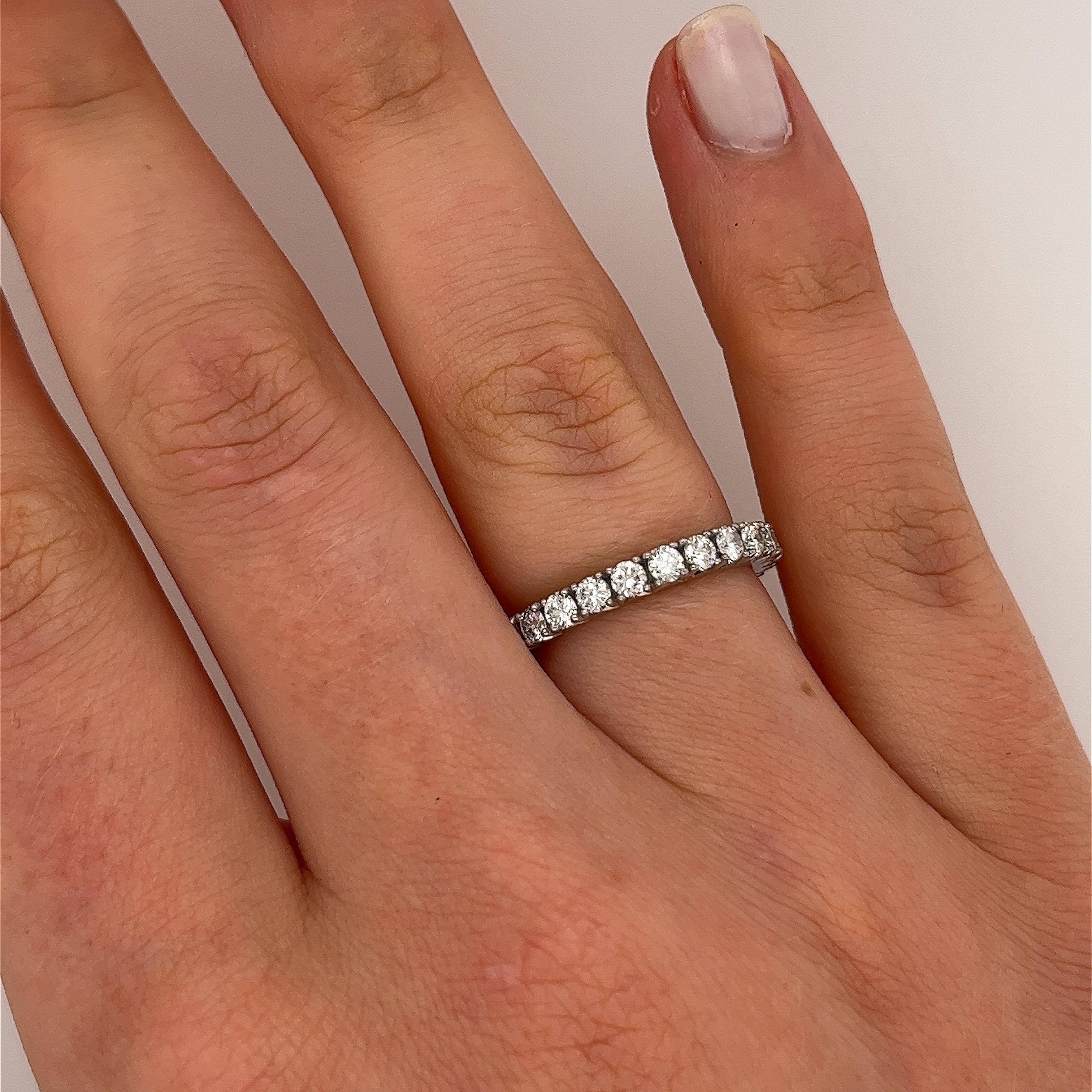 Full eternity platinum diamond ring
set with 1.36 carats of natural round brilliant cut diamonds 
in lustrous platinum, 
this ring is the perfect symbol of your unending commitment. 
Total Diamond Weight: 1.36ct 
Diamond Colour: G-H
Diamond Clarity: