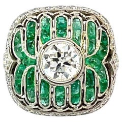 Platinum Galbé Ring – 0.90ct Diamond, Cabochon Emeralds and Diamond Accents