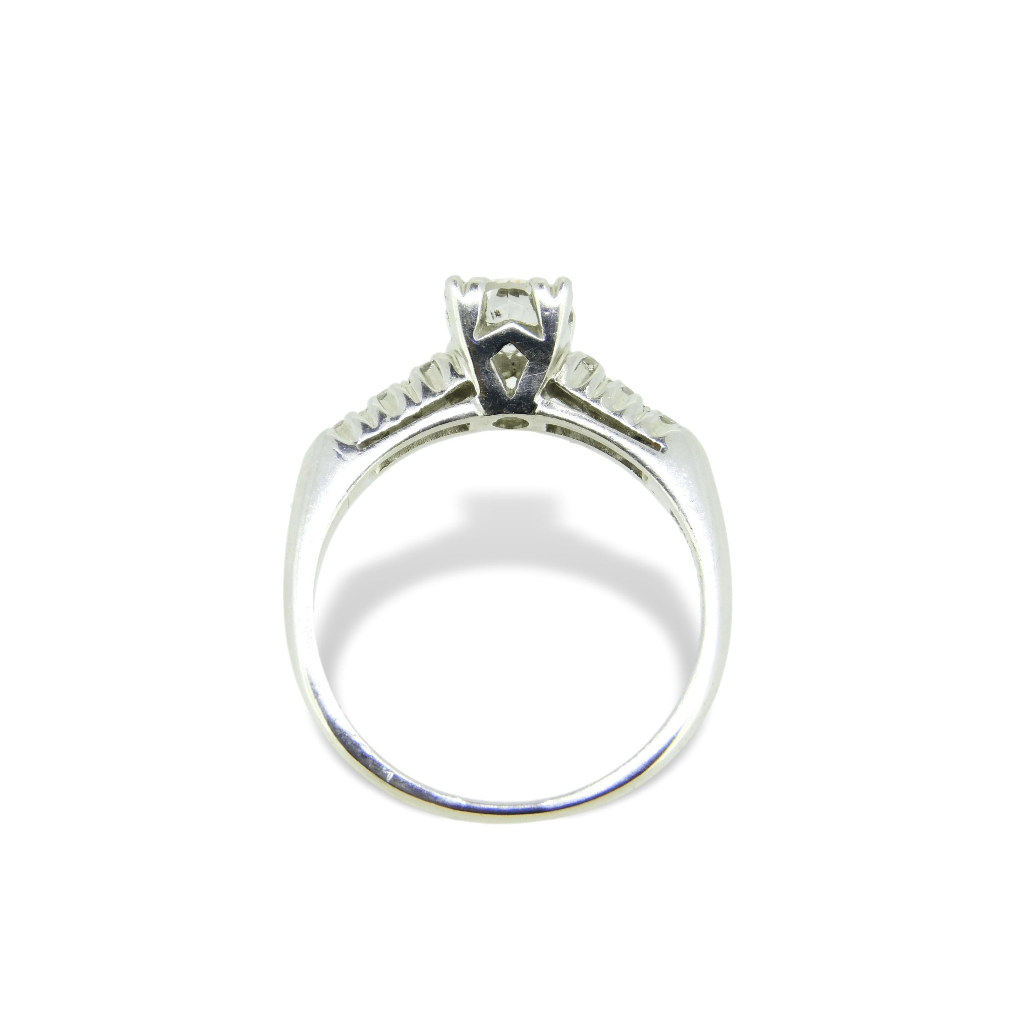 Platinum Genuine Natural Diamond Engagement Ring .66cts (#J750)

Platinum diamond engagement ring with a round brilliant cut diamond weighing .54cts. The diamond measures 5.4mm with SI clarity and I color. There are six small round diamond accents