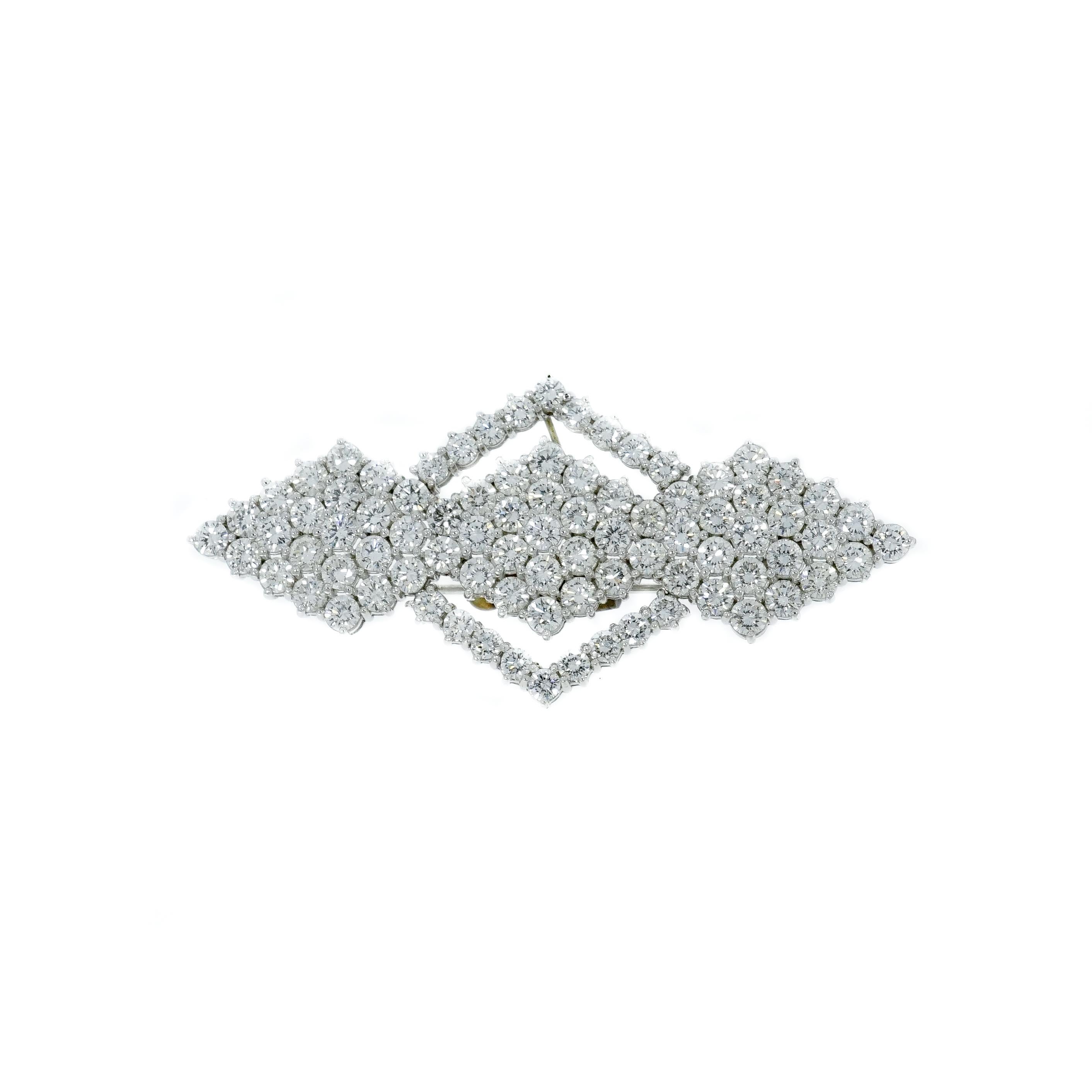 Comprised of approximately 80 Diamonds totaling around 10 carats total weight.
Set in Platinum and arranged in a geometrical shaped.
 