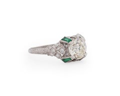 Platinum GIA 1.51 Carat Diamond Brilliant Engagement Ring with Emerald Accents