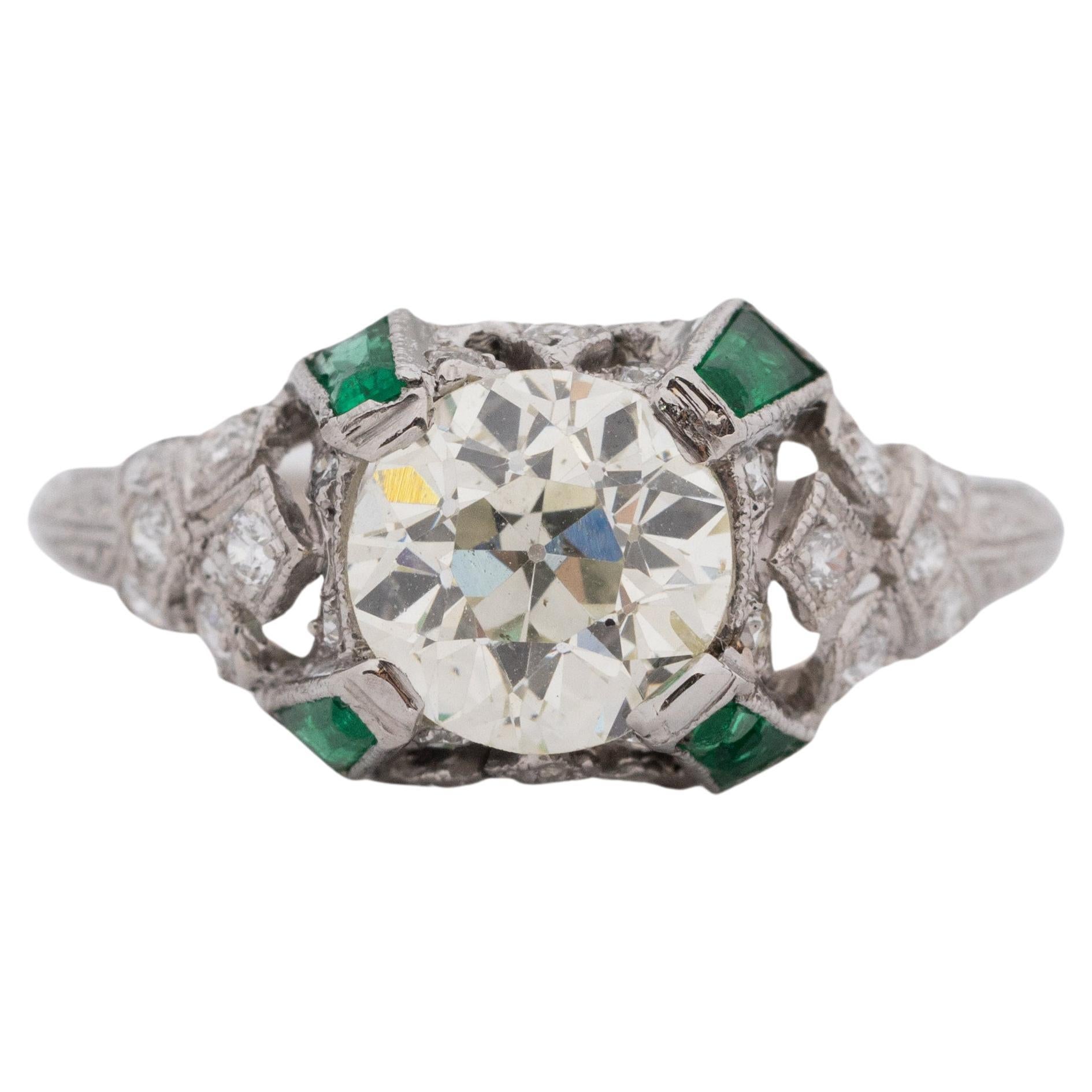 Platinum GIA 1.51 Carat Diamond Brilliant Engagement Ring with Emerald Accents For Sale