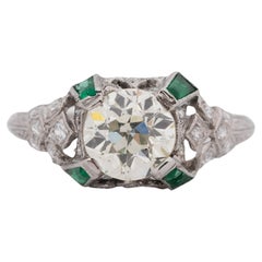 Antique Platinum GIA 1.51 Carat Diamond Brilliant Engagement Ring with Emerald Accents