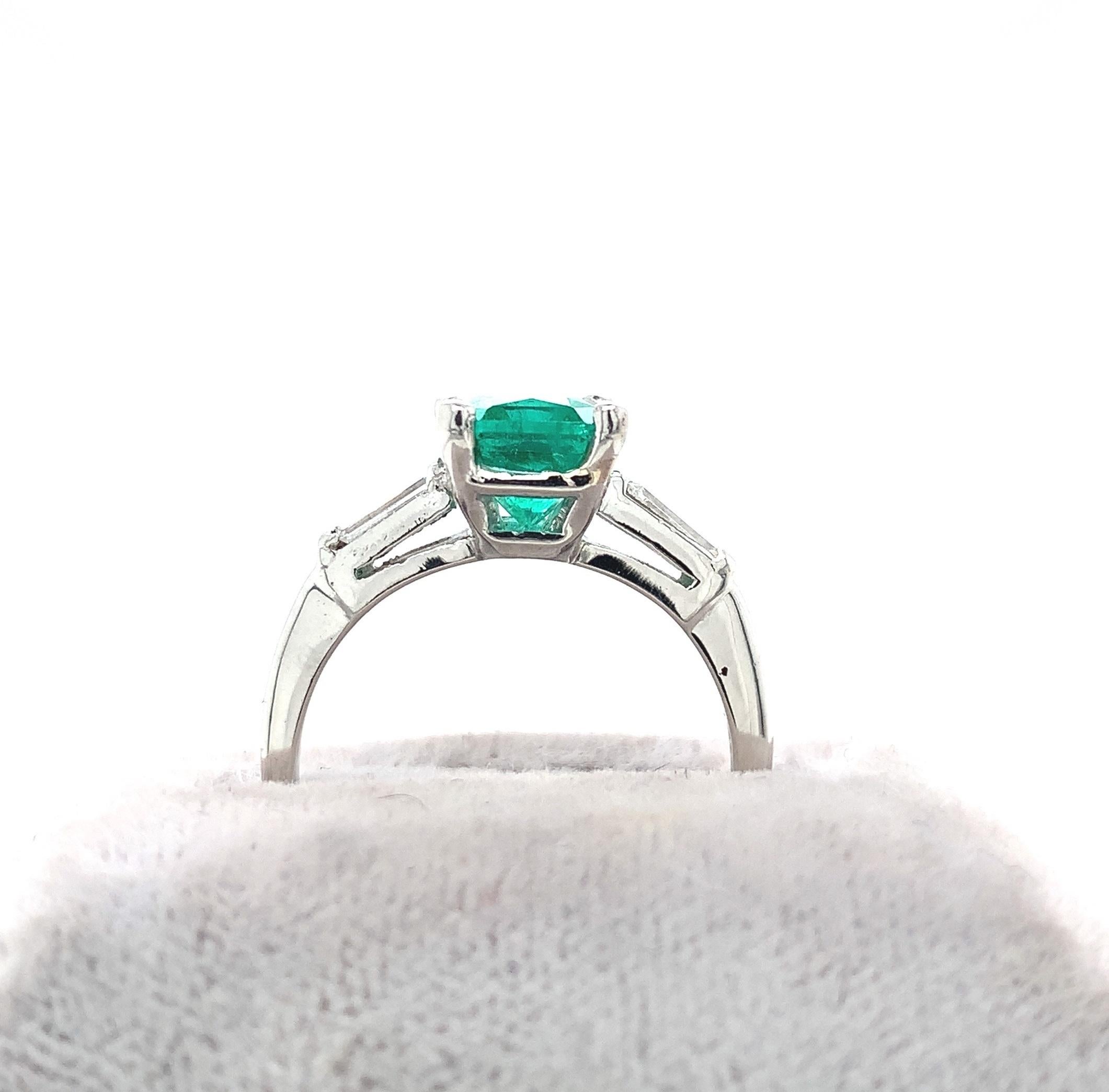 Brilliant Cut Platinum GIA 1.87 Carat Emerald and Diamond Ring For Sale