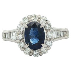 Anello in platino GIA 1,8ct con zaffiro blu reale, rotondo e diamante baguette