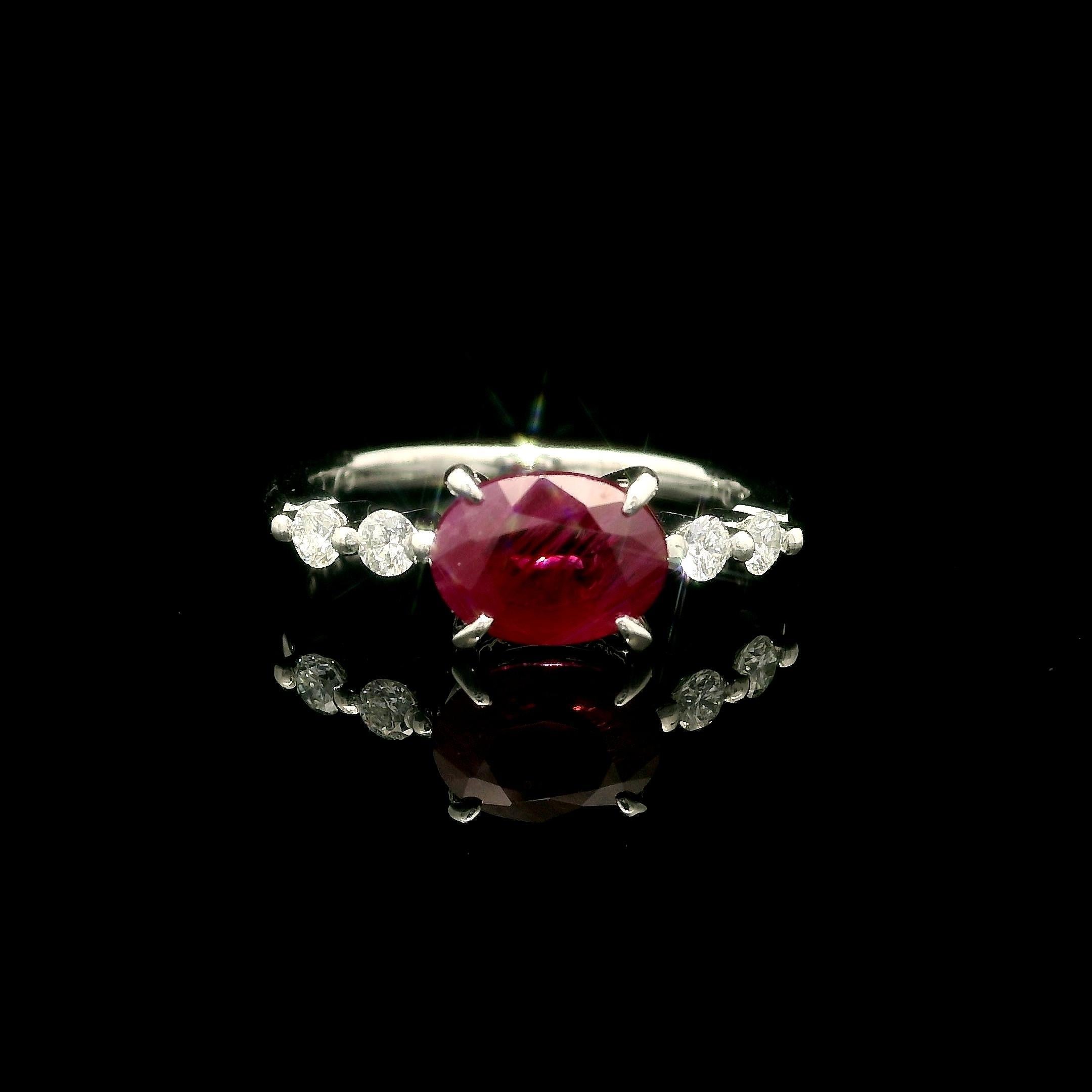 --Stone(s):--
(1) Natural Genuine Ruby - Oval Cut - Prong Set - Deep Red Color - Burma - Heated - 1.79ct (exact stamped)
** See Certification Details Below for Complete Info **
(4) Natural Genuine Diamonds - Round Brilliant Cut - Prong Set - Nice
