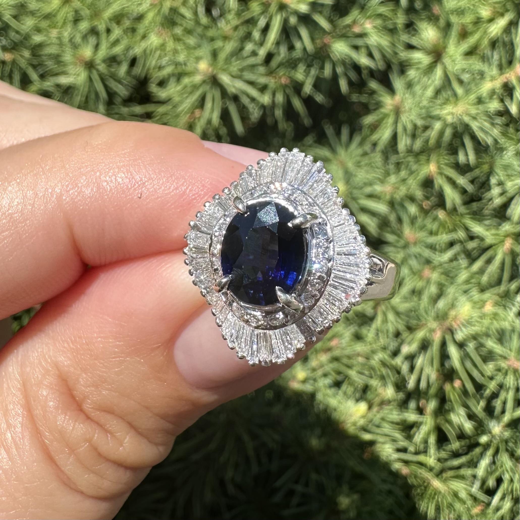 --Stone(s):--
(1) Natural Genuine Sapphire - Oval Cut - Prong Set - Dark Royal Blue Color - No Heat - Ceylon - 1.41ct (exact)
** See Certification Details Below for Complete Info **
Numerous Natural Genuine Diamonds - Baguette & Round Brilliant Cut