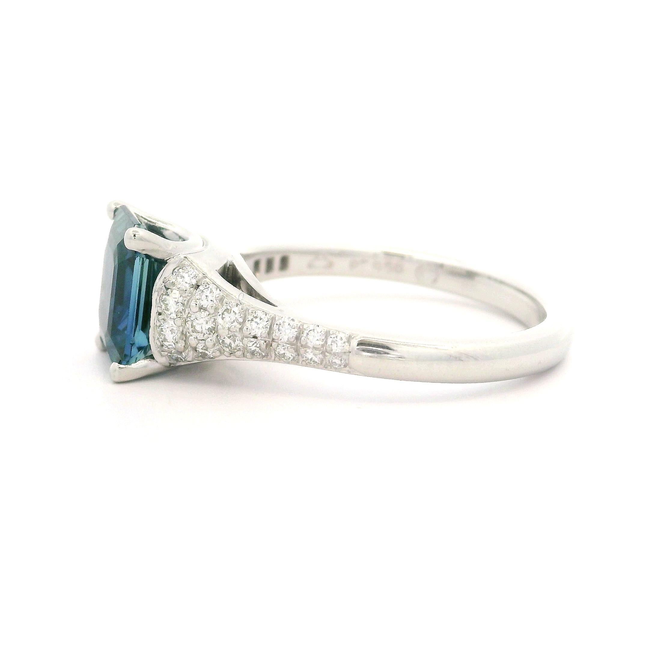 --Stone(s):--
(1) Natural Genuine Sapphire - Emerald Cut - Prong Set - Unique Blue Color - No Heat - 2.16ct (exact certified)
** See Certification Details Below for Complete Info **
(34) Natural Genuine Diamonds - Round Brilliant Cut - Pave Set -