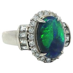 Platin GIA 2,93ctw Oval Cabochon Schwarz Opal W / Diamant Halo & Seiten Ring