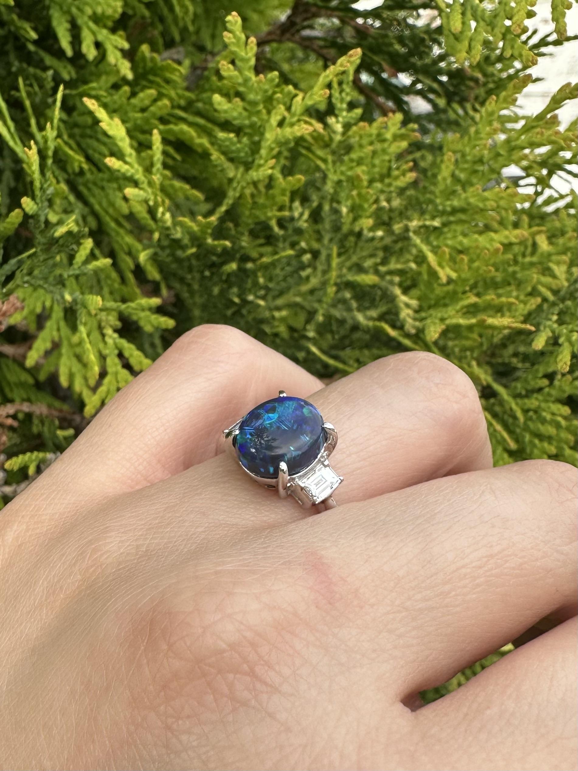 --Stone(s):--
(1) Natural Genuine Opal - Oval Double Cabochon Cut - Prong Set - Black Color w/ Very Nice Play of Blue & Green Colors - 2.81ct (exact - stamped)
**See Certification Details Below For More Info**
(2) Natural Genuine Diamonds - Straight
