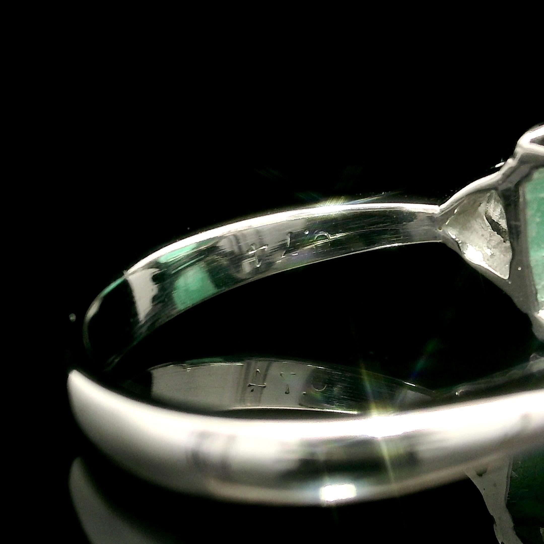 --Stone(s):--
(1) Natural Genuine Emerald - Octagonal Step Cut - Prong Set - Very Nice Green Color - Clean - Natural Inclusions - 2.58ct (exact)
** See Certification Details Below for Complete Info ** 
(2) Natural Genuine Diamonds - Trillion Cut -