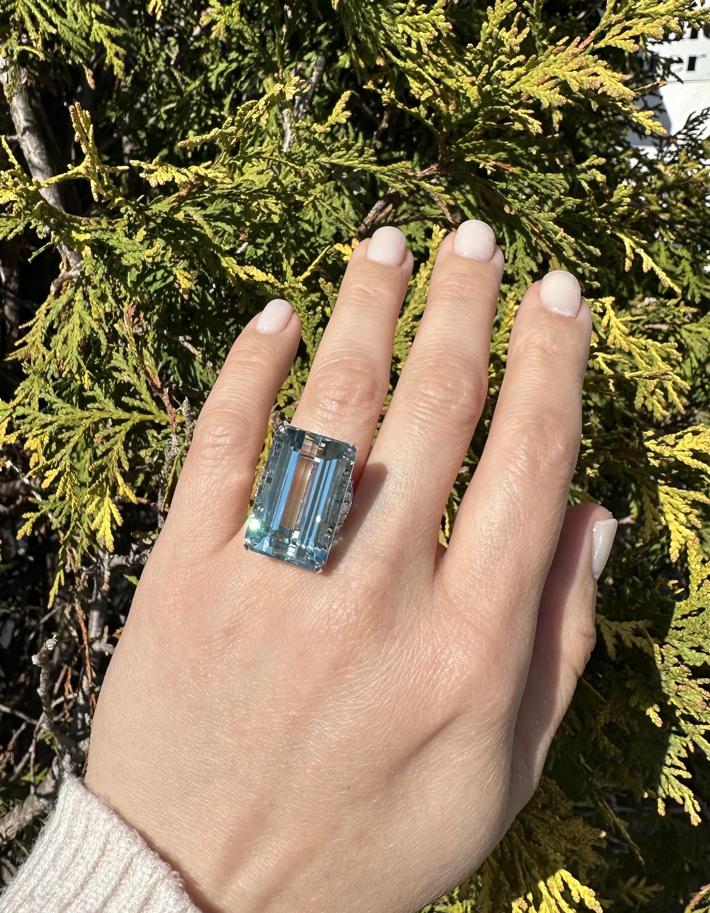 --Stones:--
1 Natural Genuine Aquamarine - Elongated Emerald Cut - Prong Set - Gorgeous Blue Color - 36.60ct exact -1.54 ratio
*See Certification Information Below*
210 Natural Genuine Diamonds - Round Brilliant Cut - Prong Set - Nice Brilliant