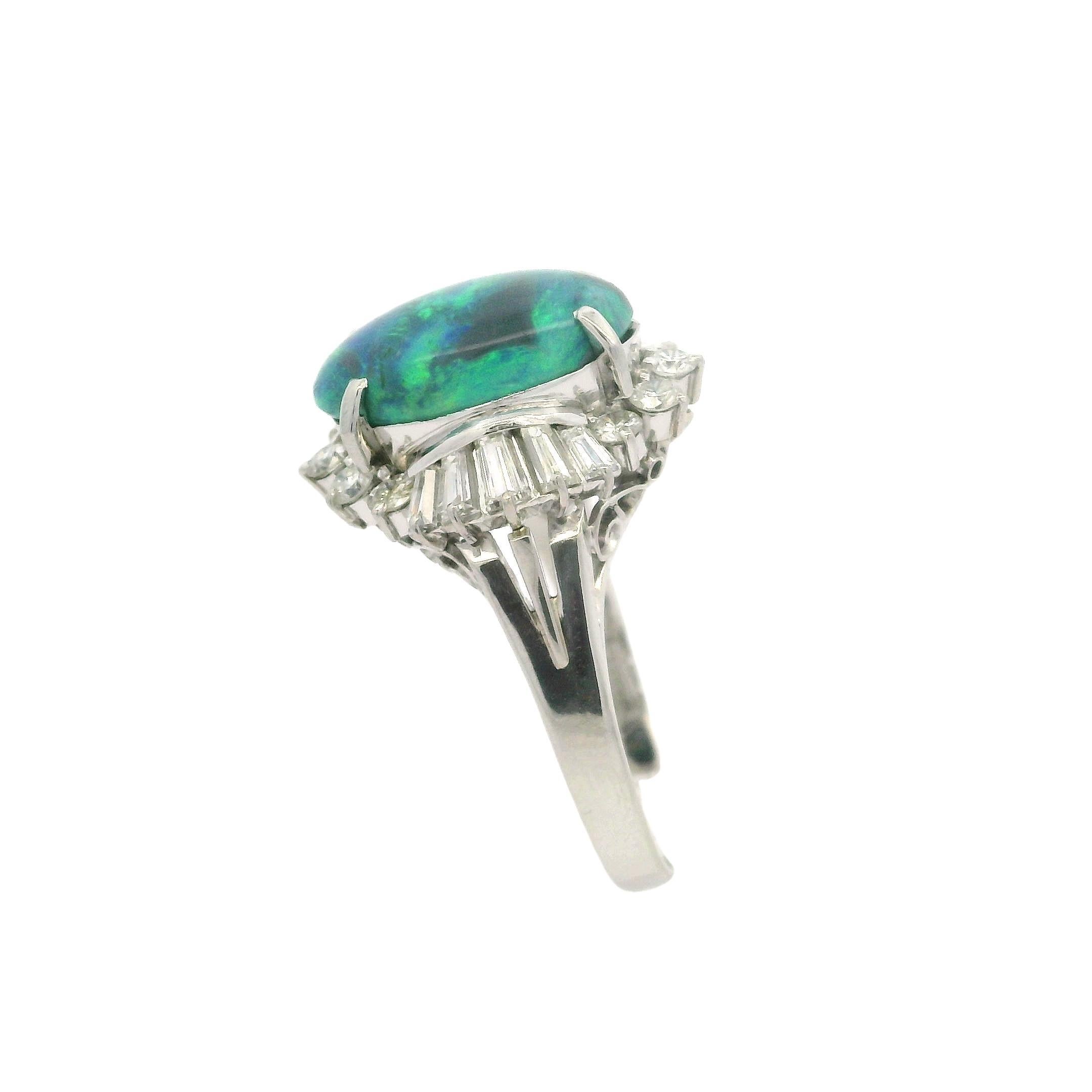 --Piedra(s):--
(1) Ópalo auténtico natural - talla cabujón oval - engastado - color negro con increíble juego de colores verde y azul - 13,98 x 8,24 x 4,57 mm / 3,01 ct (exacto - certificado)
**Ver detalles de la certificación más abajo para más