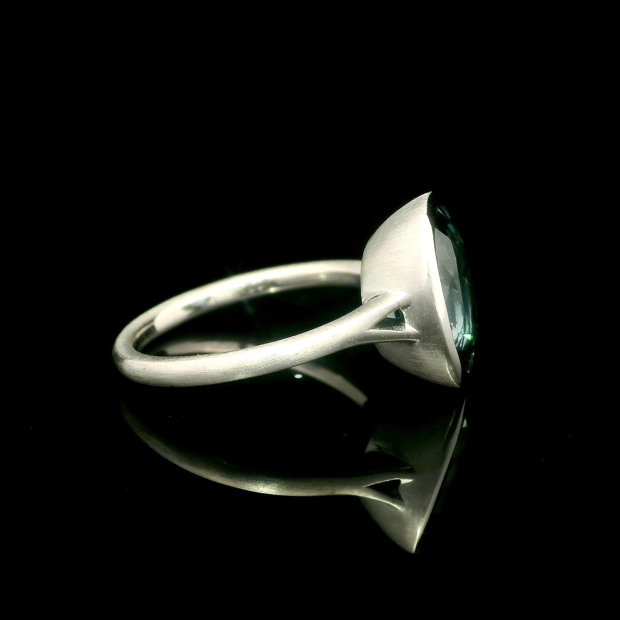 --Stone(s):--
(1) Natural Genuine Sapphire - Cushiony Oval Cut - Bezel Set - Blue Color - 5.05ct (Exact-certified)
** See Certification Details Below for Complete Info **

Material: Solid .900+ Platinum - stamped PLAT
Weight: 7.25 Grams
Ring Size: