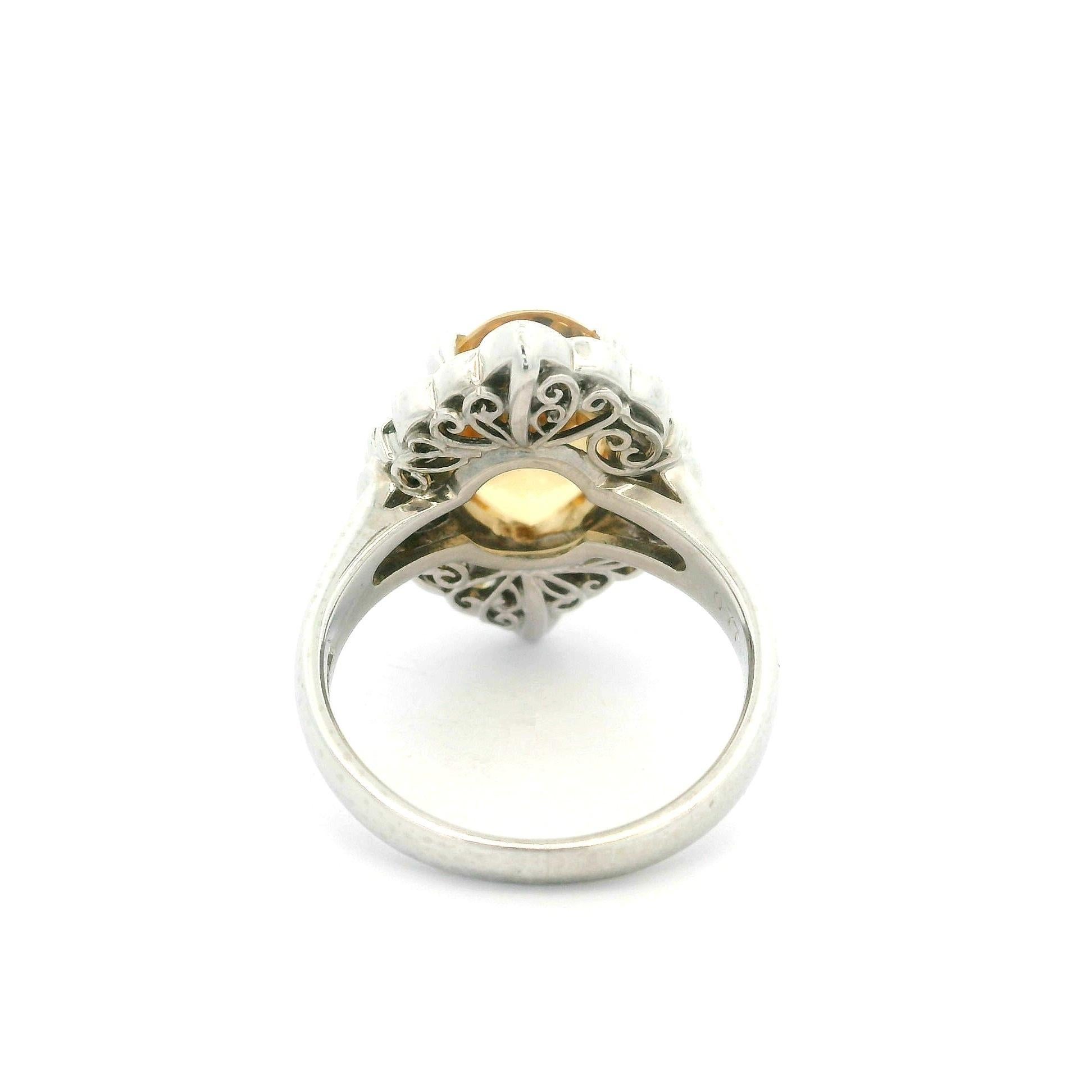 Platinum GIA 5.51ctw Oval Orangy Yellow Imperial Topaz & Diamond Ring For Sale 1