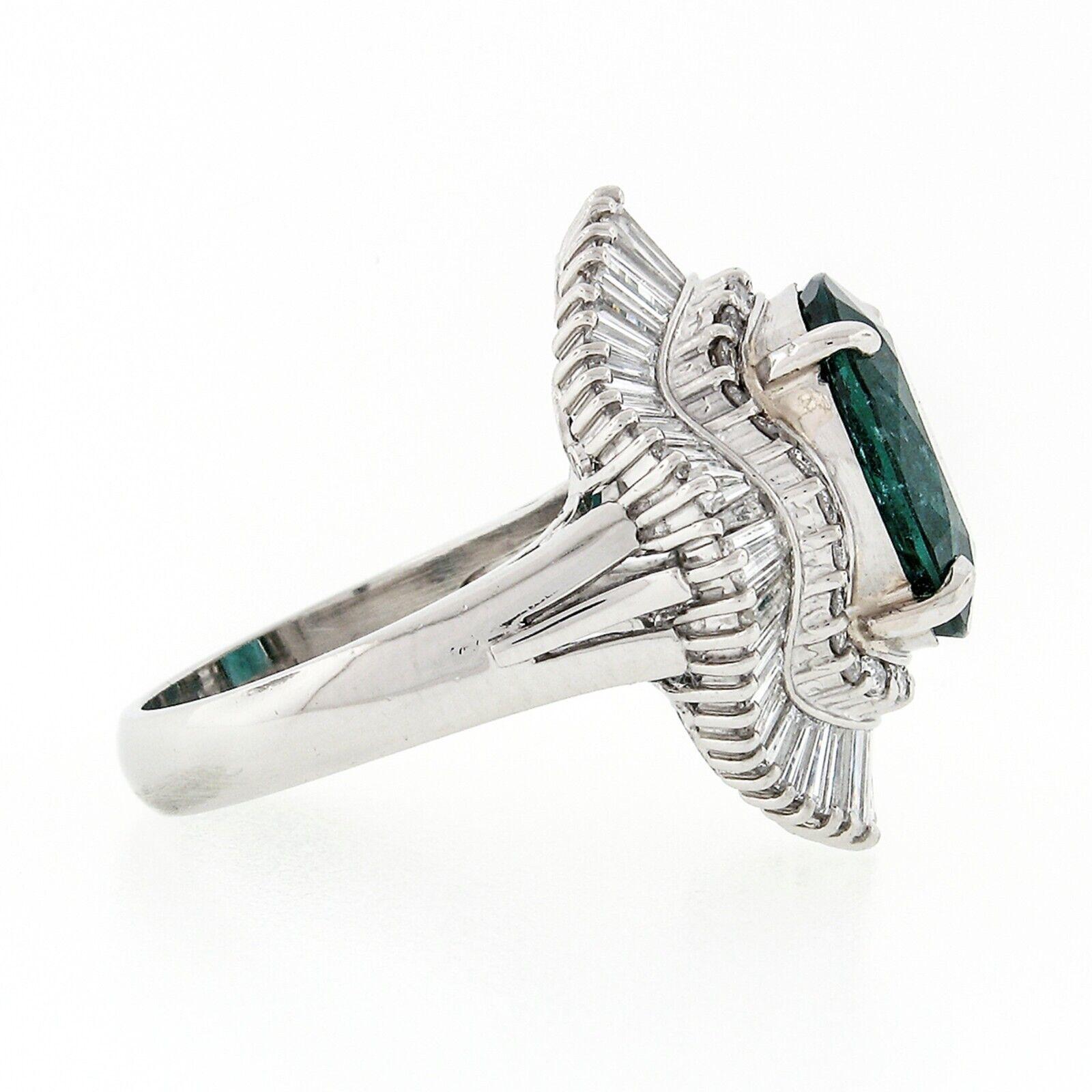 Art Deco Platinum GIA 5.59 Carat Oval Emerald and Baguette Diamond Wave Ballerina Ring