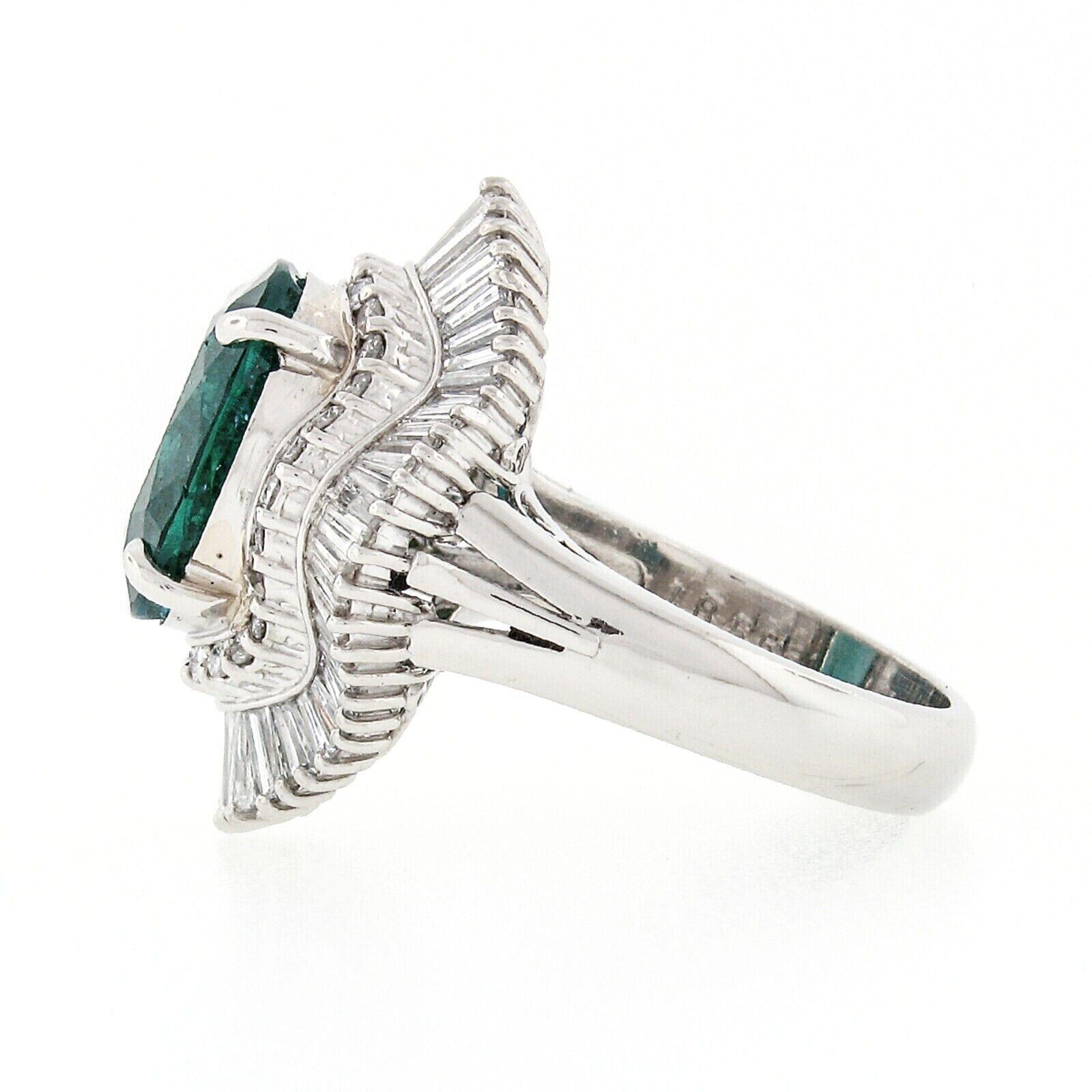 Oval Cut Platinum GIA 5.59 Carat Oval Emerald and Baguette Diamond Wave Ballerina Ring