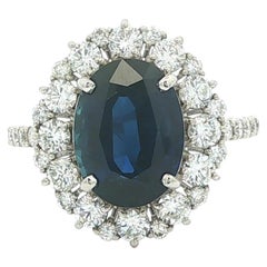 Platinum GIA 5.5ctw Oval Deep Blue Sapphire Diamond Frame Classic Ring