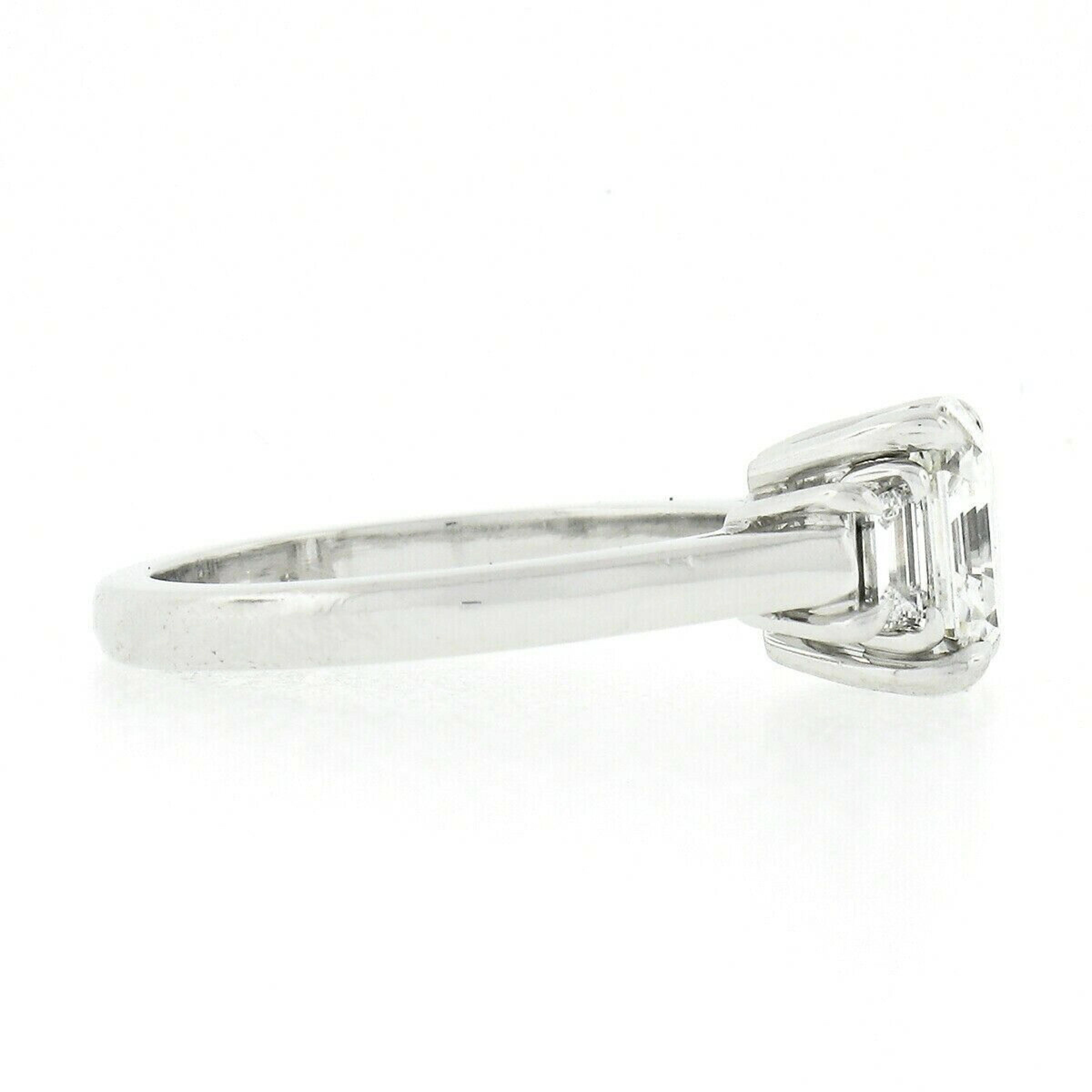 asscher cut diamond ring with trapezoids