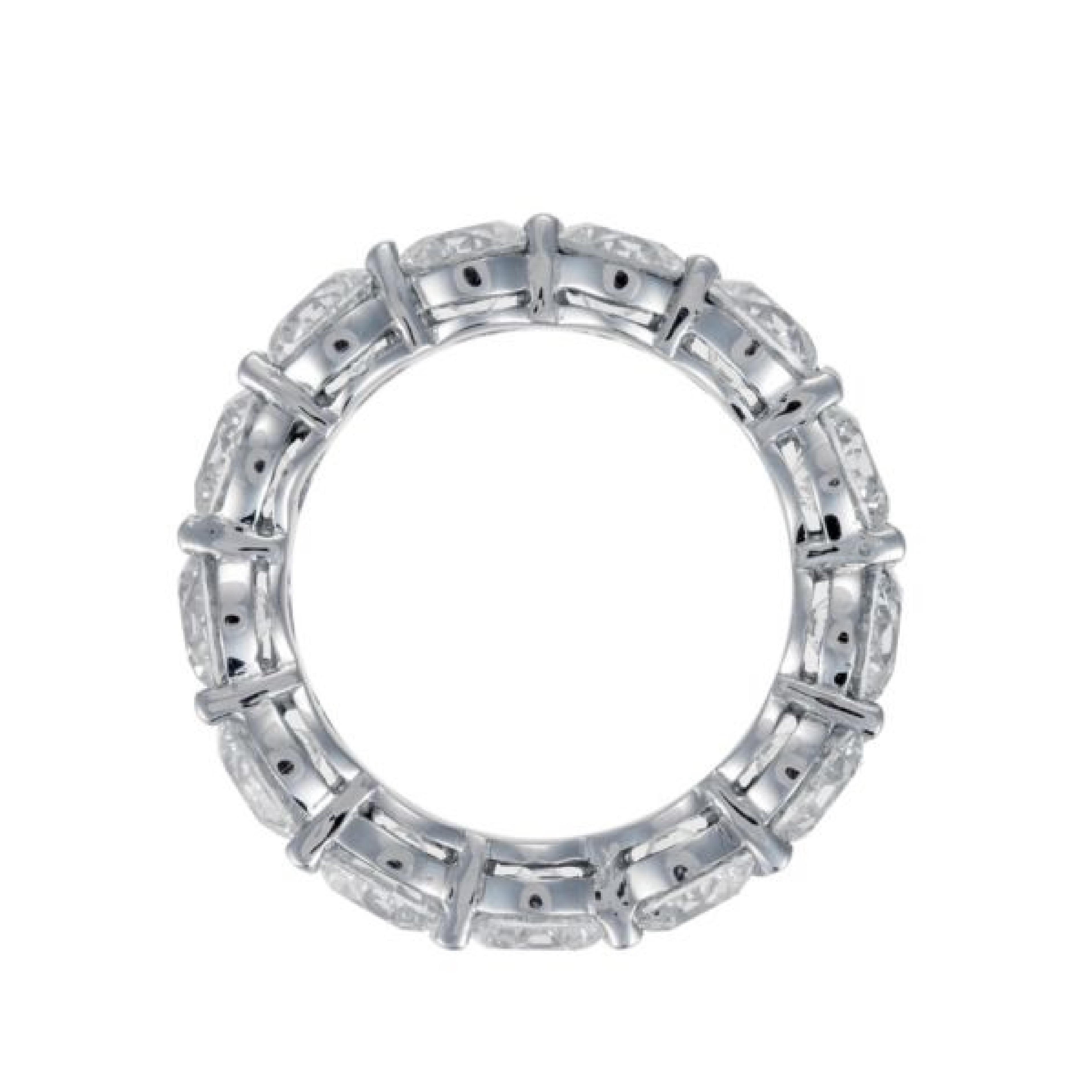 Platinum Diamond Eternity band, features 13 GIA Round brilliant cut diamonds, collection color and quality. Total diamond weight is 13.14 Carats, Each stone comes with GIA Certificate, D-E-F in color VVS-VS in clarity. Ring size 6 

