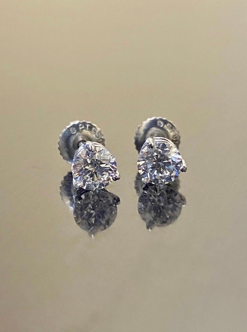 Modern Platinum GIA Certified 1.40 Carat Round E and F Color Diamond Stud Earrings For Sale
