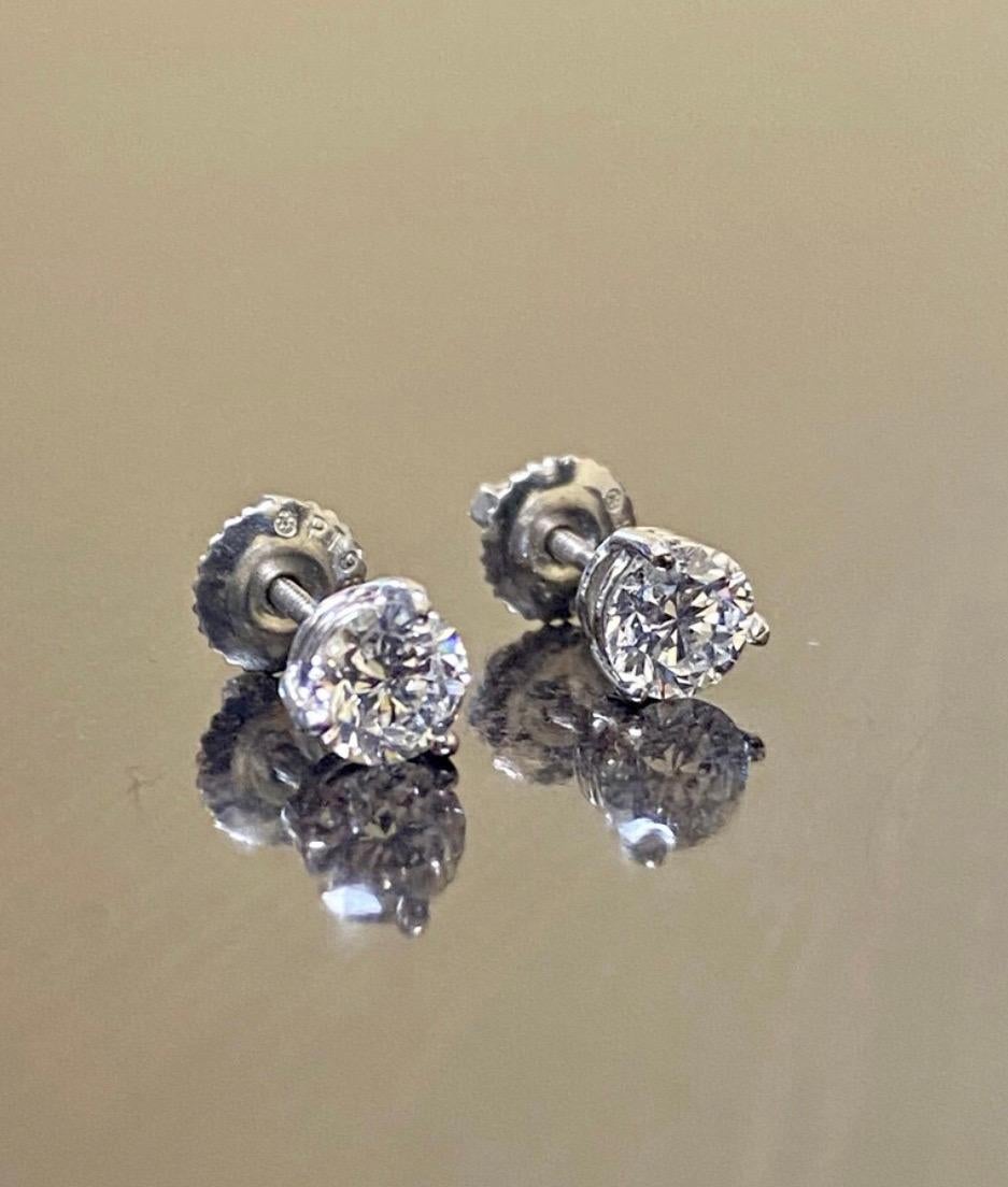 Round Cut Platinum GIA Certified 1.40 Carat Round E and F Color Diamond Stud Earrings For Sale