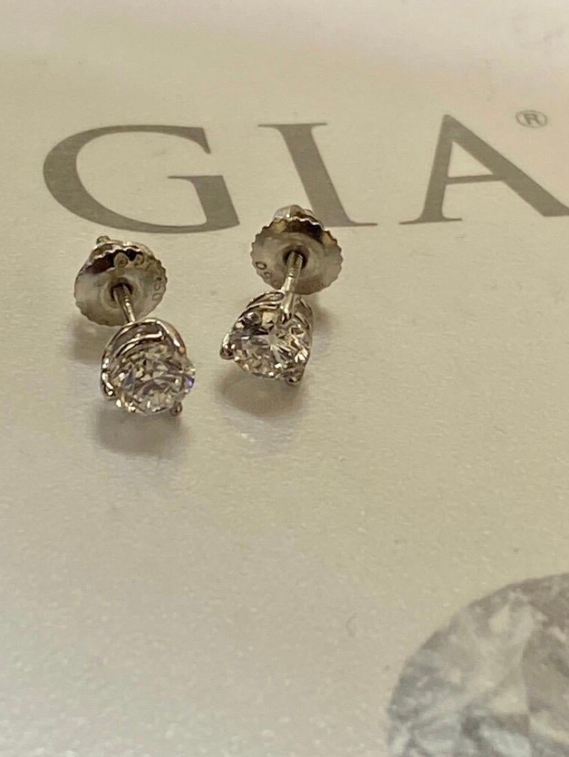 Platinum GIA Certified 1.40 Carat Round E and F Color Diamond Stud Earrings For Sale 3